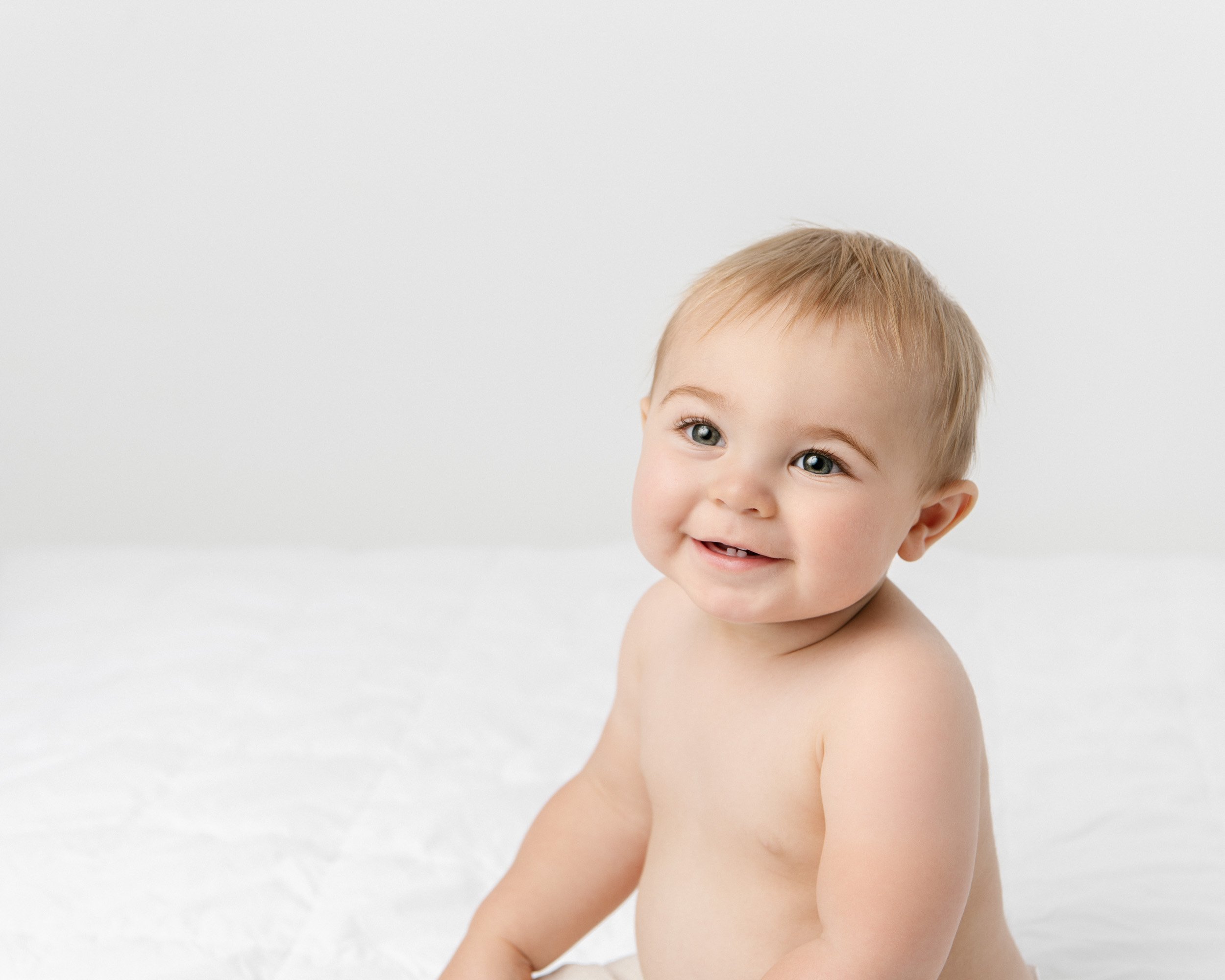  New Jersey child studio photographer captures a one-year-old without a shirt by Nicole Hawkins Photography. studio birthday #NicoleHawkinsPhotography #NicoleHawkinsBabies #BirthdayStudioPhotography #smashcake #firstbirthday #studiobabiesandchildren 