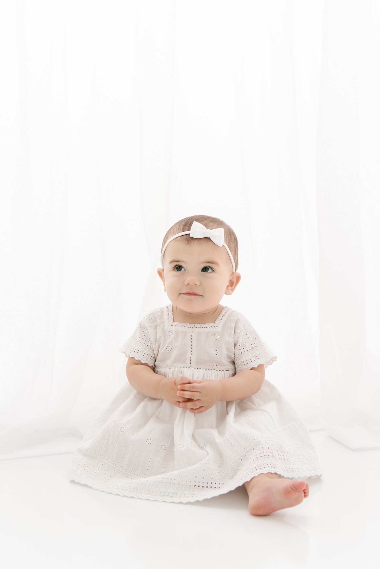  Nicole Hawkins Photography captures a simple studio portrait of a baby girl for her birthday. birthday portraits NJ #NicoleHawkinsPhotography #firstbirthday #babyportraits #NJphotographers #lifestylephotography #studiobabies #childrenphotography 