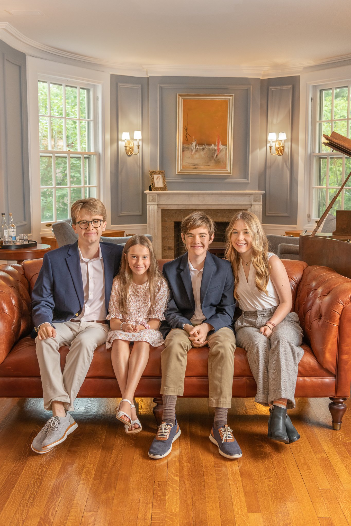  A family portrait was taken in a colonial home in Summit, NJ by Nicole Hawkins Photography with four siblings. professional family pics #NicoleHawkinsPhotography #NicoleHawkinsFamilyPortrait #NicoleHawkinsSenior #NJPortraits #siblingportrait 