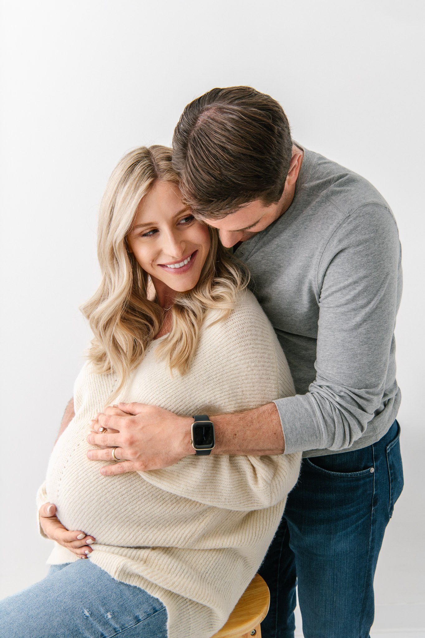  Dad-to-be feels the baby kick in the womb captured by Nicole Hawkins Photography in northern NJ. parents feel baby kick #NicoleHawkinsPhotography #NicoleHawkinsMaternity #Studiomaternityportraits #NewJerseymaternity #NewYorkMaternity 