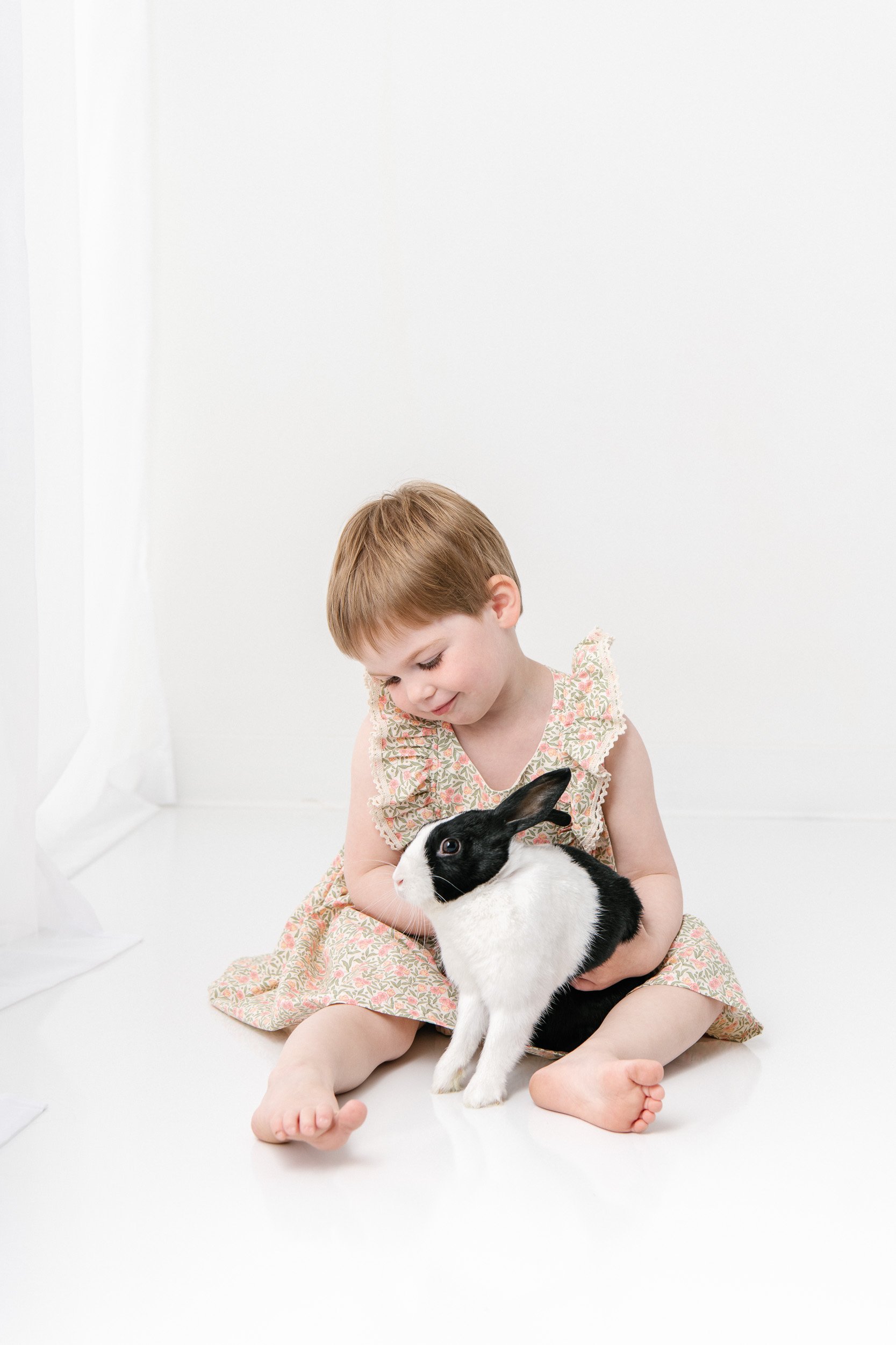  Three-year-old studio birthday portraits are taken with her bunny by Nicole Hawkins Photography. girl and bunny pets and kids #NicoleHawkinsPhotography #NicoleHawkinsChildren #3rdbirthday #studioportrait #agirlandherbunny #littlegirl  