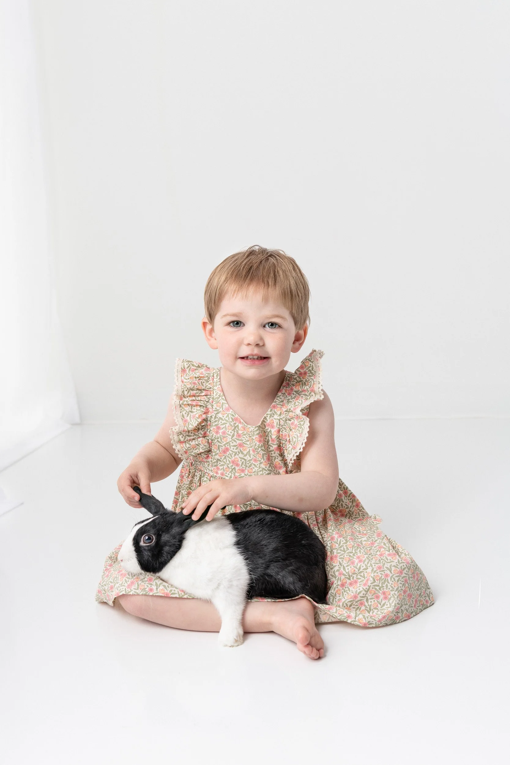  Nicole Hawkins Photography captures a portrait of a little girl making a silly face while holding a bunny rabbit. silly toddler face #NicoleHawkinsPhotography #NicoleHawkinsChildren #3rdbirthday #studioportrait #agirlandherbunny #littlegirl&nbsp; 