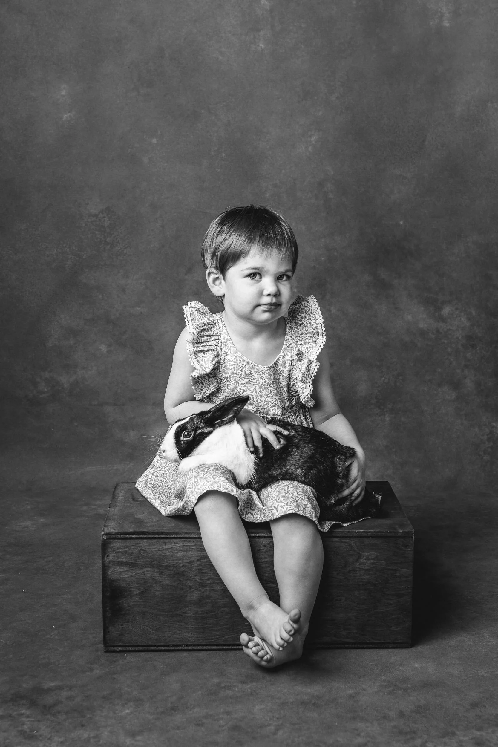  A moody portrait of a girl holding her bunny for her third birthday by Nicole Hawkins Photography. birthday kid portraits #NicoleHawkinsPhotography #NicoleHawkinsChildren #3rdbirthday #studioportrait #agirlandherbunny #littlegirl  