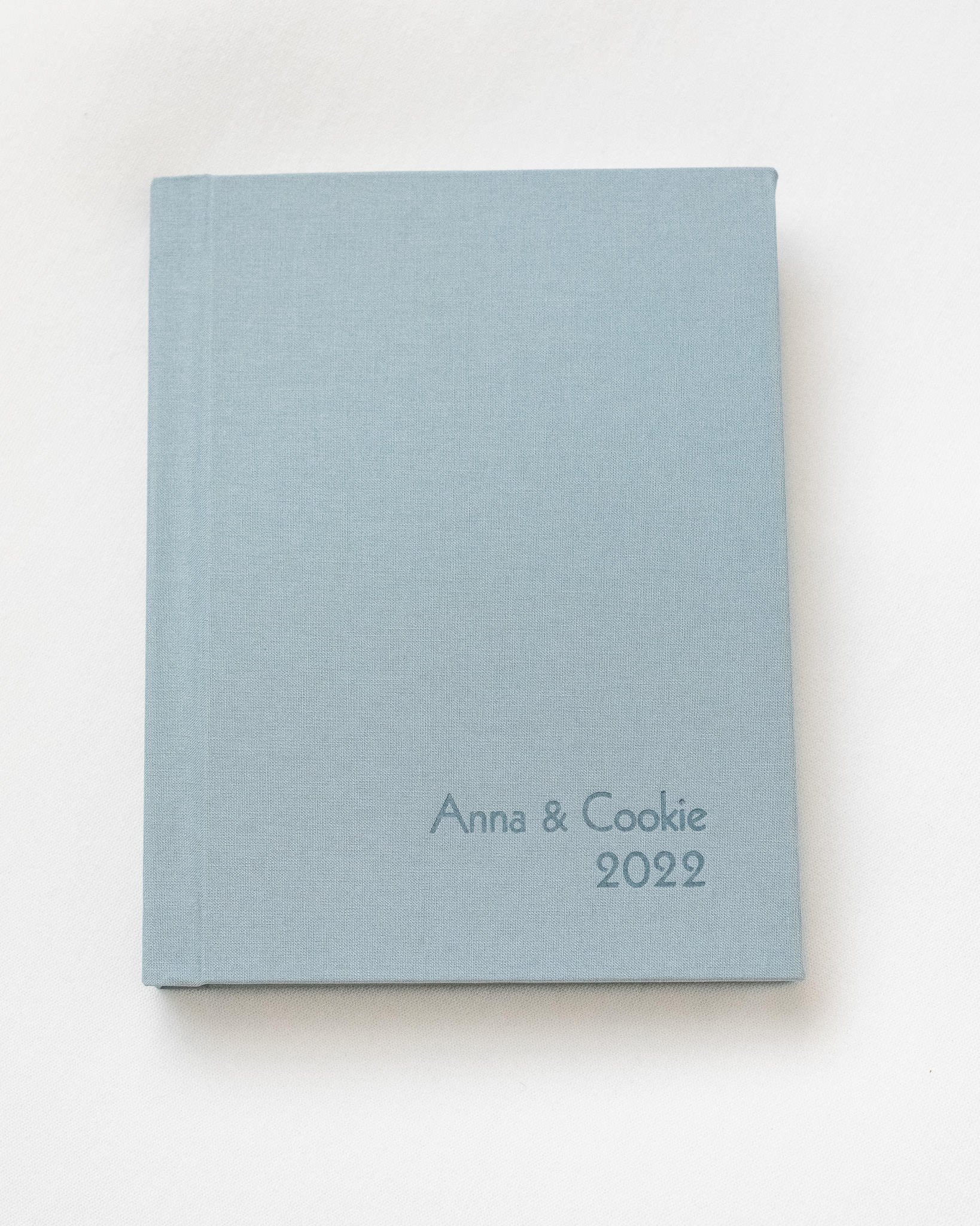 Luxe_blue_green_matted_portrait_album_web-1.jpg