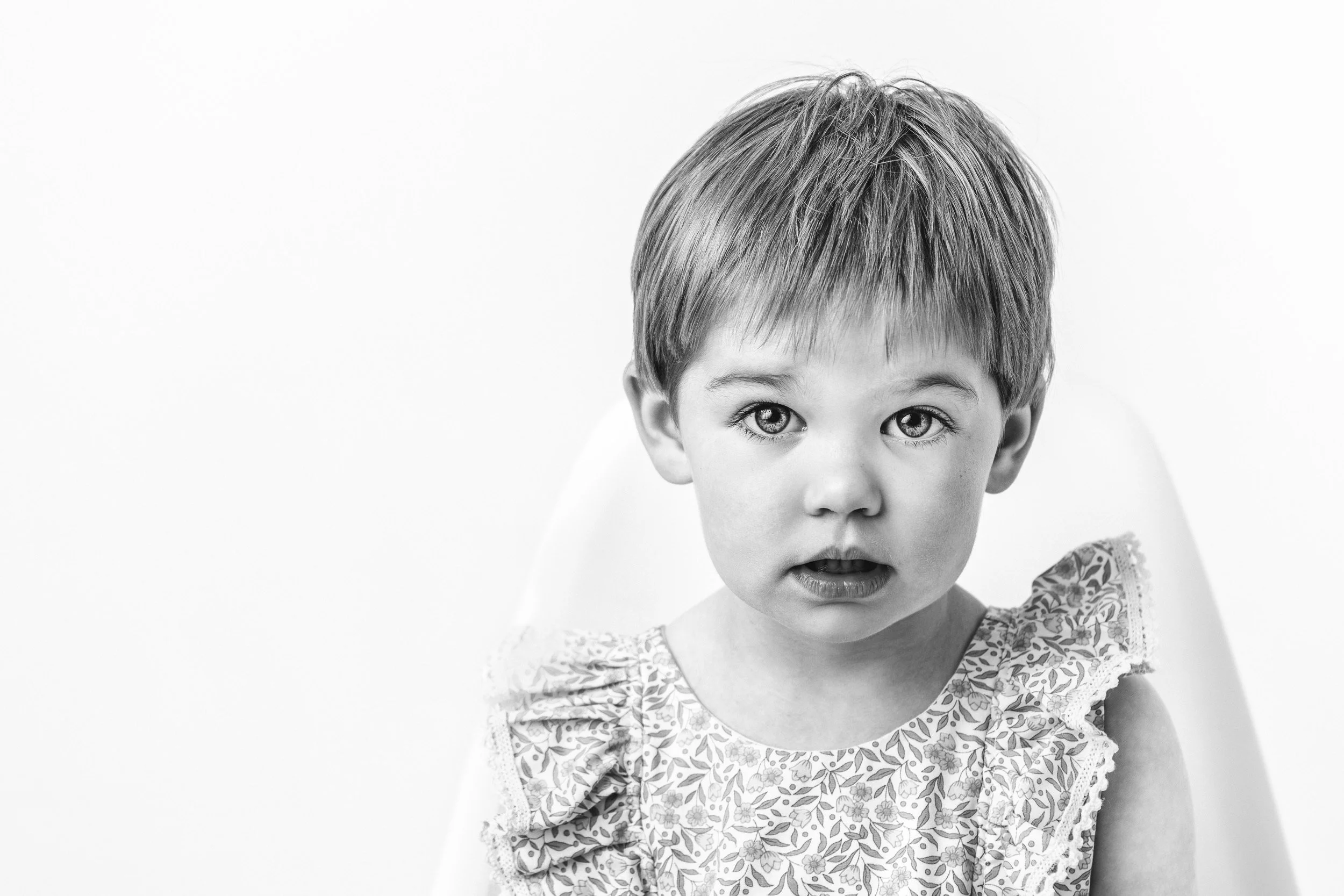 Face portrait of a little girl with short hair in black and white by Nicole Hawkins Photography. New Jersey photographer #NicoleHawkinsPhotography #NicoleHawkinsChildren #3rdbirthday #studioportrait #agirlandherbunny #littlegirl  