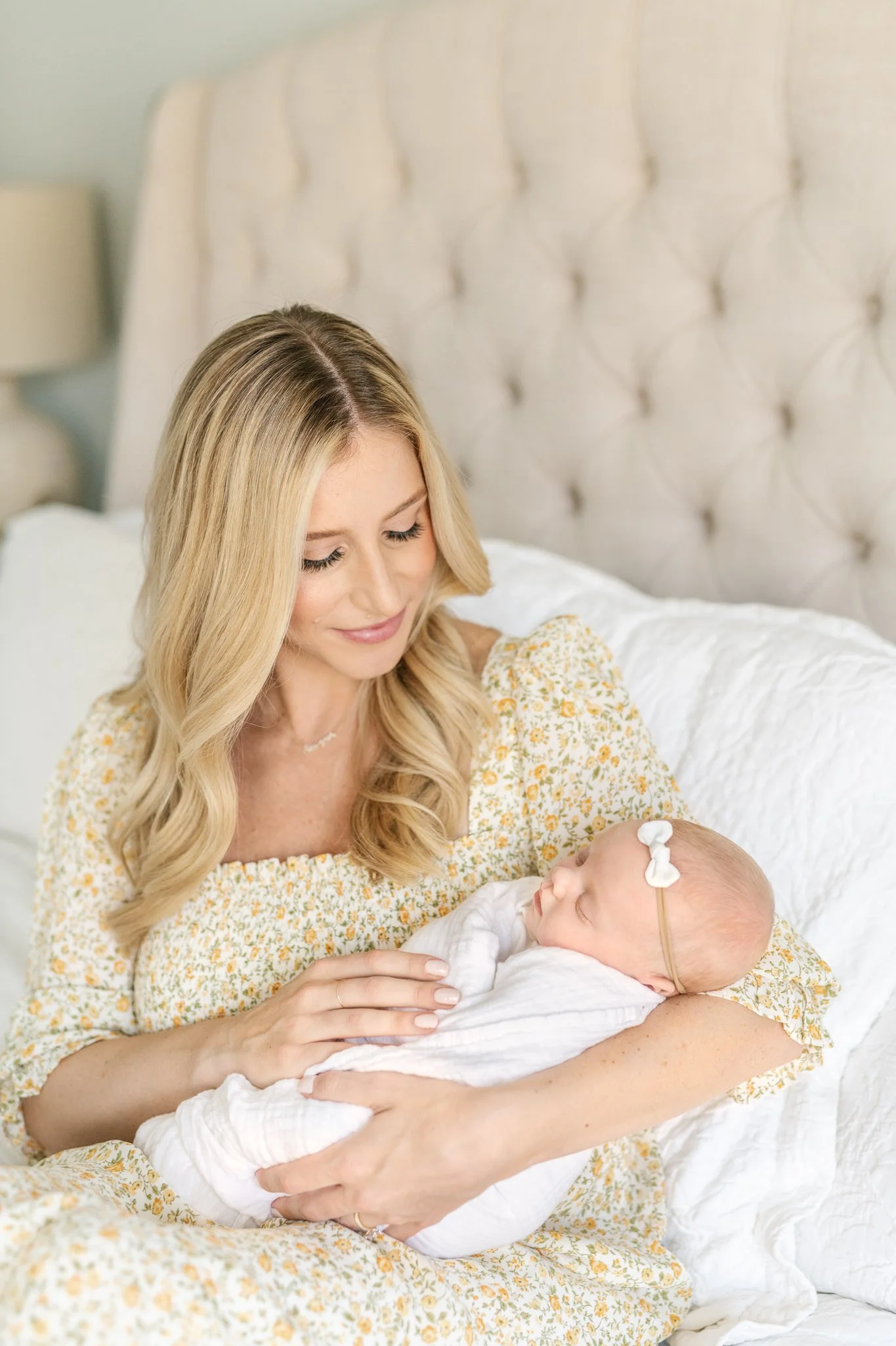  A mother looking lovingly at her baby girl captured by Nicole Hawkins Photography in New Jersey. in home newborn in NJ #NicoleHawkinsPhotography #NicoleHawkinsNewborns #InHomeNewborns #NewJerseyNewborns #NewYorkNewborns #babygirlnewborns 