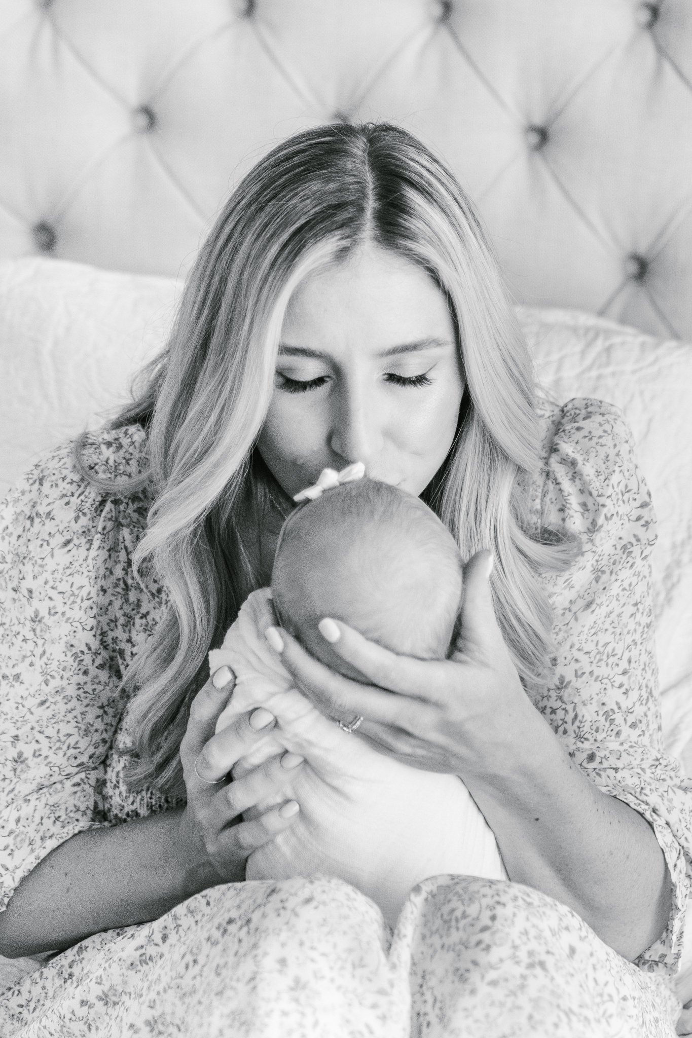  During an in-home newborn session, Nicole Hawkins Photography captures a mother kissing her baby girl. kissing baby #NicoleHawkinsPhotography #NicoleHawkinsNewborns #InHomeNewborns #NewJerseyNewborns #NewYorkNewborns #babygirlnewborns 