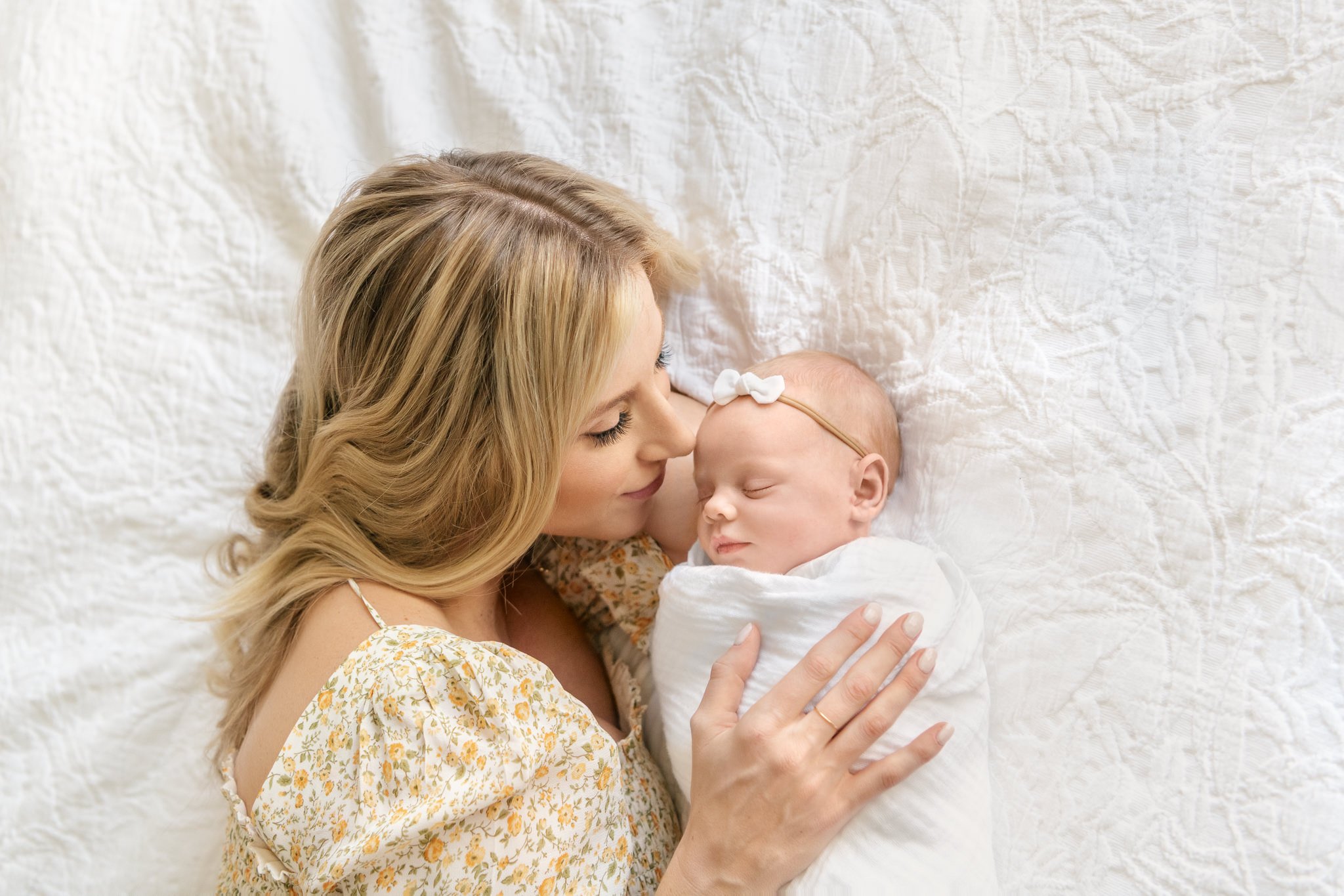  Intimate motherhood photography with mother and baby snuggling on bed by Nicole Hawkins Photography. mother and baby on bed #NicoleHawkinsPhotography #NicoleHawkinsNewborns #InHomeNewborns #NewJerseyNewborns #NewYorkNewborns #babygirlnewborns 