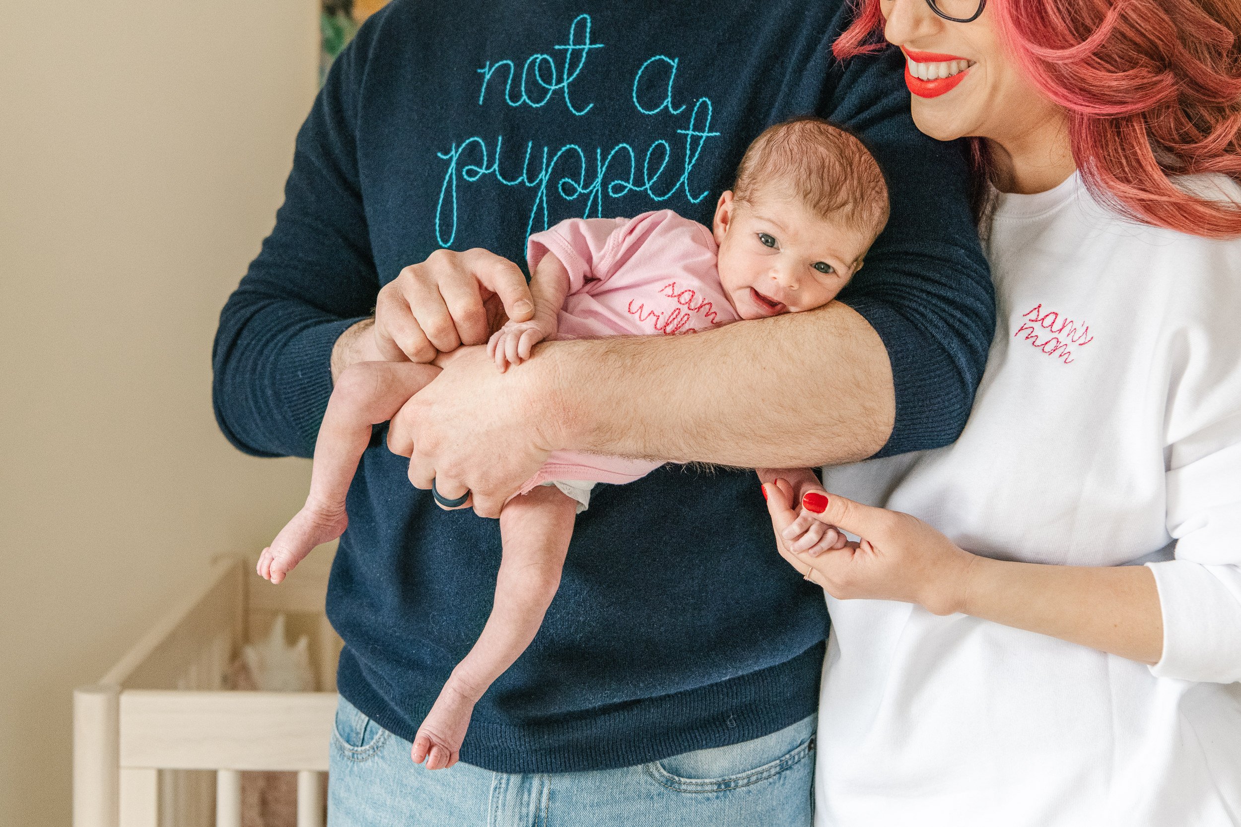  Family of three wearing matching family shirts with name embroidered on them by Nicole Hawkins Photography. matching family shirts #NicoleHawkinsPhotography #NicoleHawkinsFamily #Newborns #InHomeNewborns #NicoleHawkinsNewborns #NJnewborns #NYnewborn