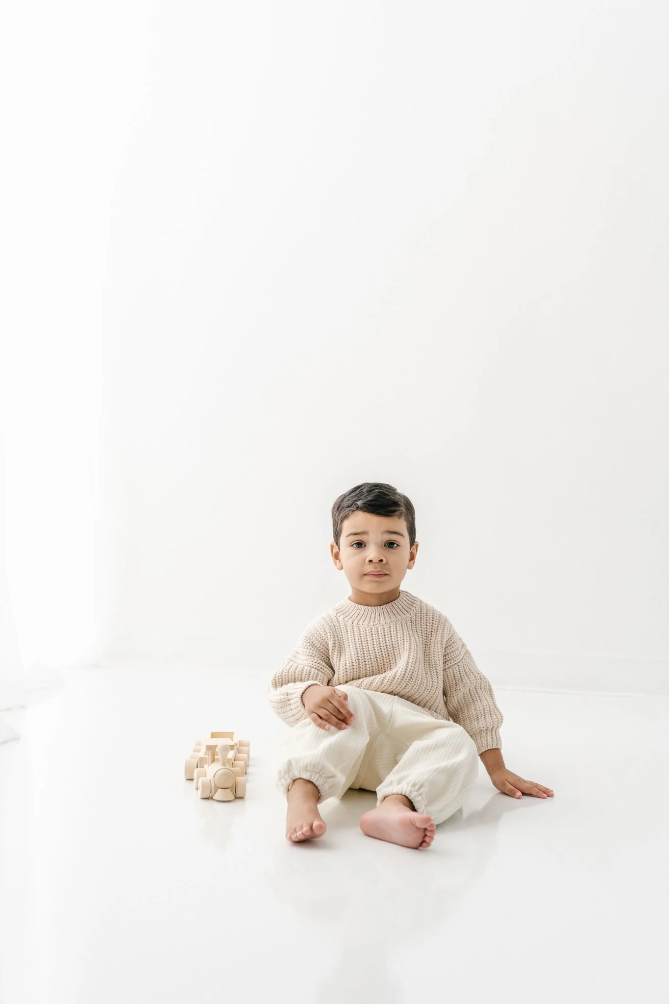  Modern studio babies and children session with Nicole Hawkins Photography in Northern New Jersey. young boy in neutral colors #NicoleHawkinsPhotograaphy #NicoleHawkinsChildren #StudioBabies&amp;Children #NJphotographers #modernportraits #mom&amp;mep