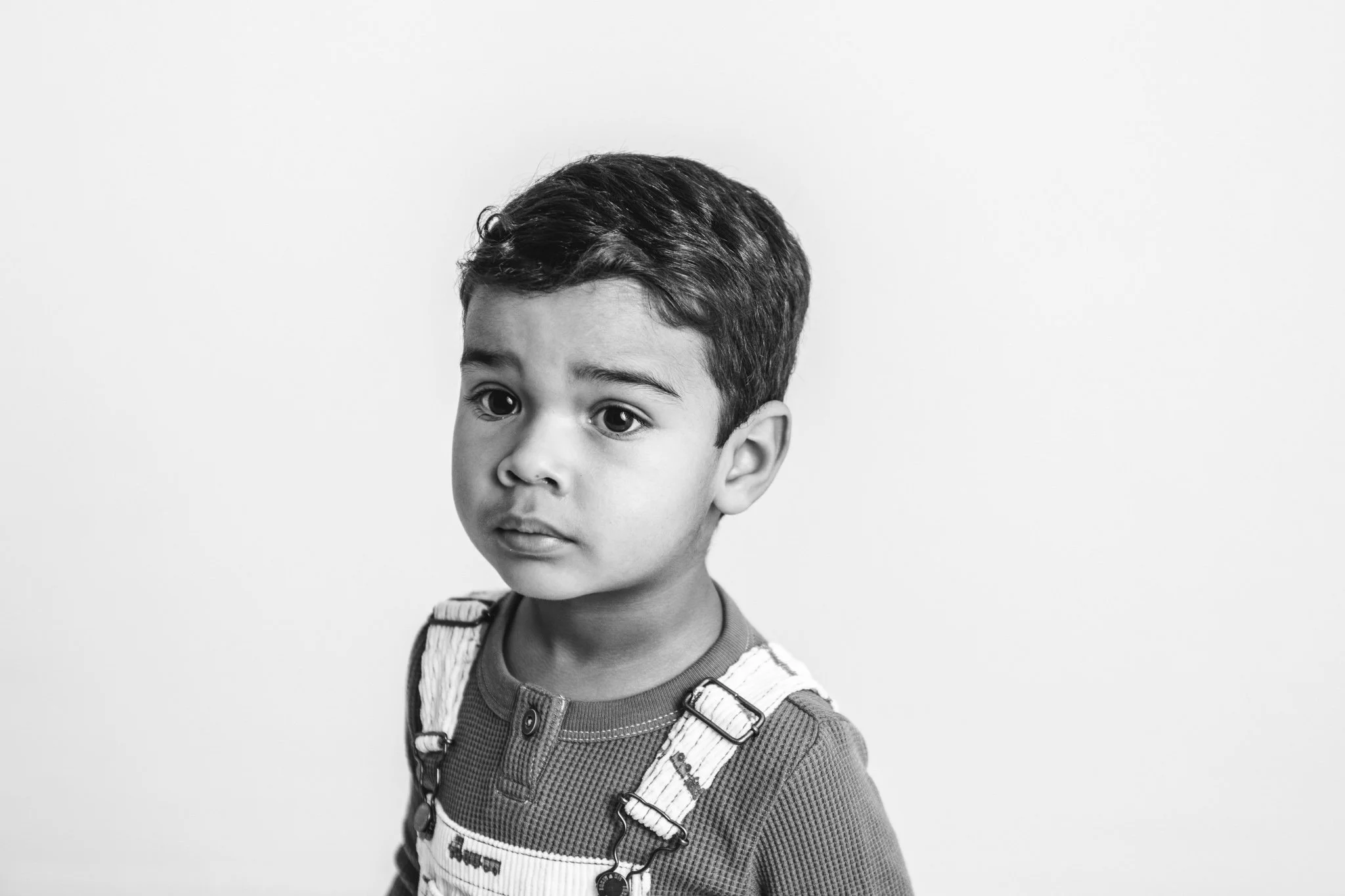  Black and white portrait of a little boy's face at a studio by Nicole Hawkins Photography. black and white portrait #NicoleHawkinsPhotograaphy #NicoleHawkinsChildren #StudioBabies&amp;Children #NJphotographers #modernportraits #mom&amp;meportraits  