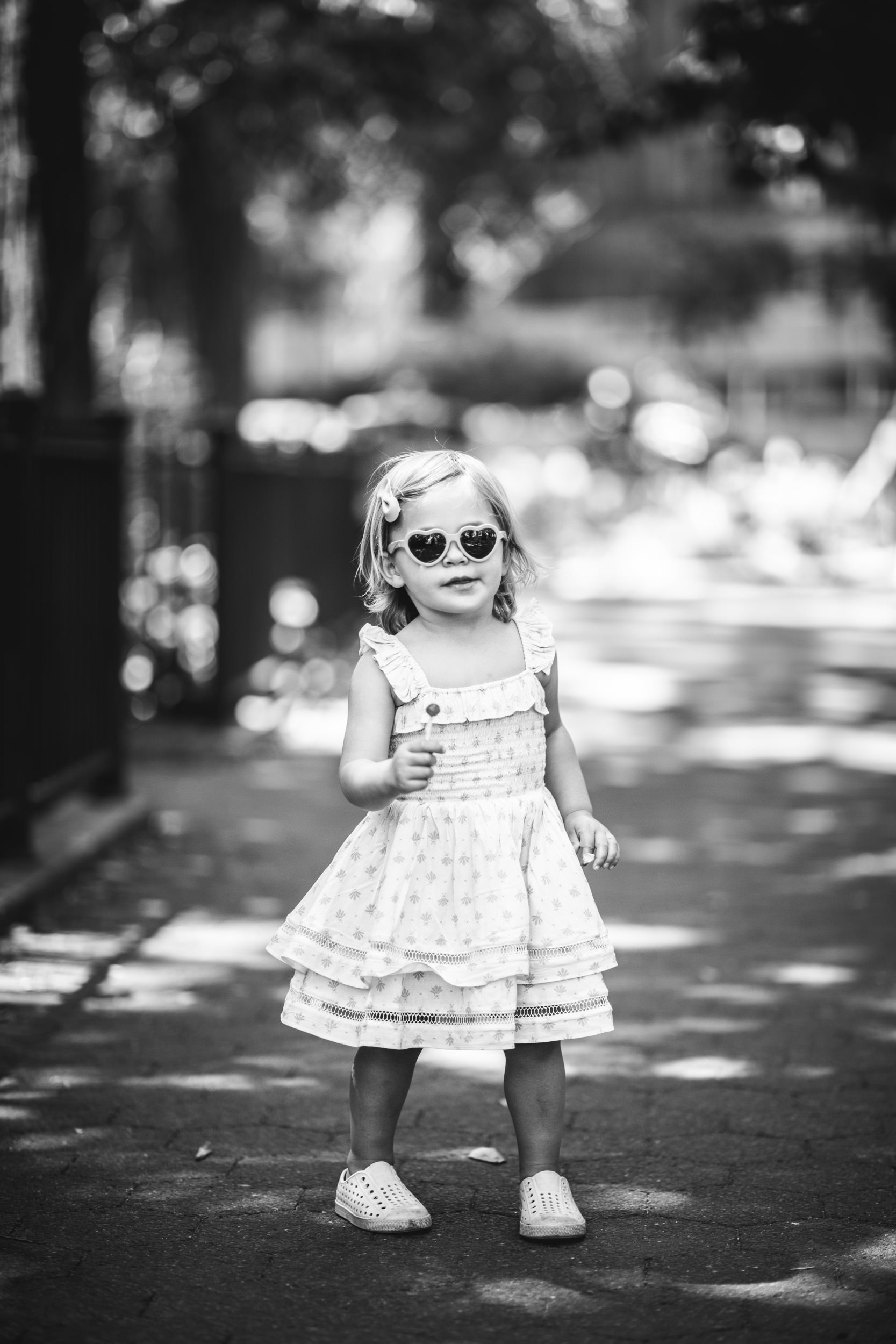  Poses for a sassy toddler girl taken in New York City by Nicole Hawkins Photography. timeless child portraits #NicoleHawkinsPhotograaphy #NicoleHawkinsChildren #NewYorkPortraits #KidsinNewYork #ChildrensPortraits #lifestyleportraits 