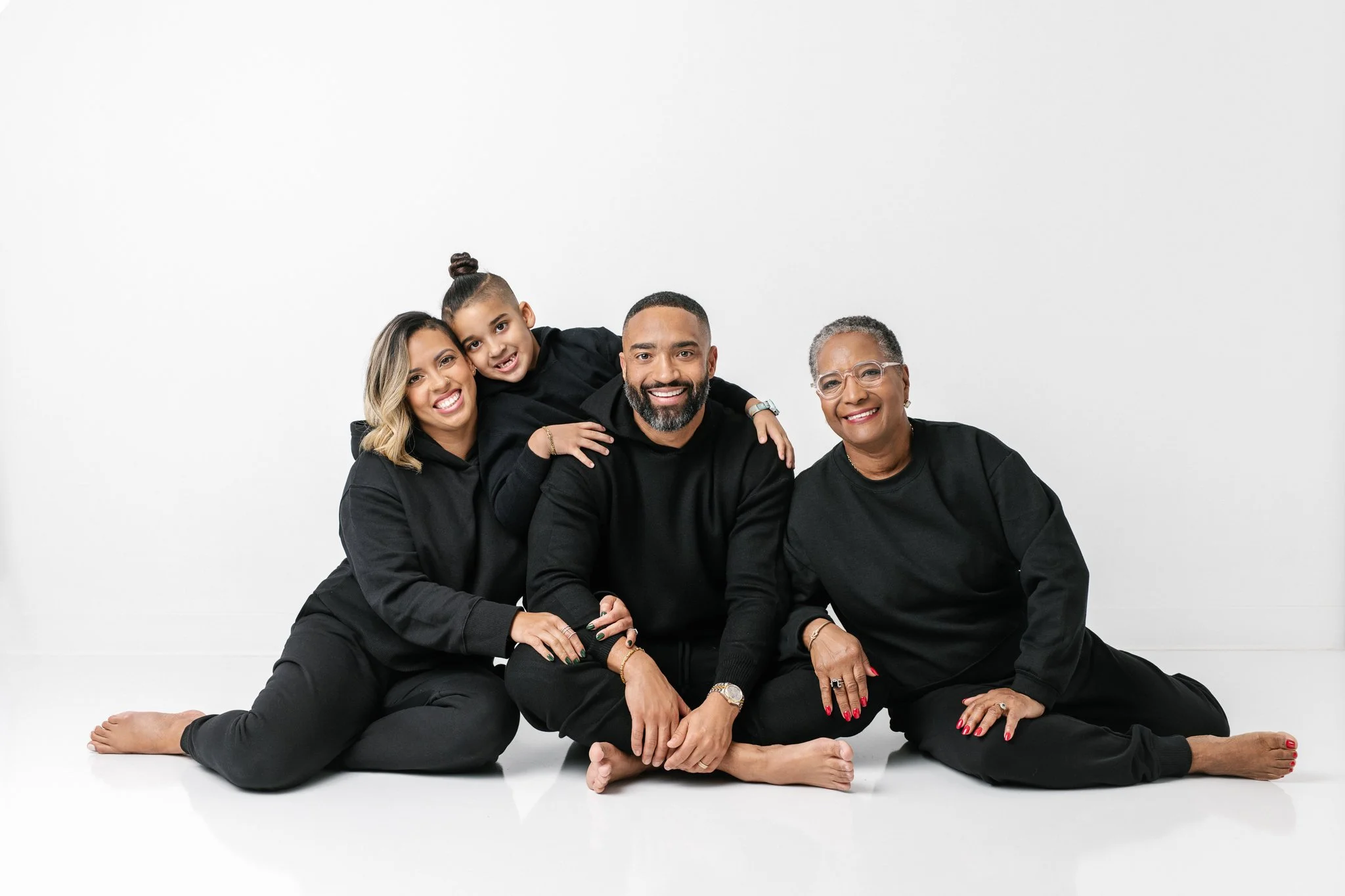 Modern Portraits with Stylish Matching Black Family Sweatsuits