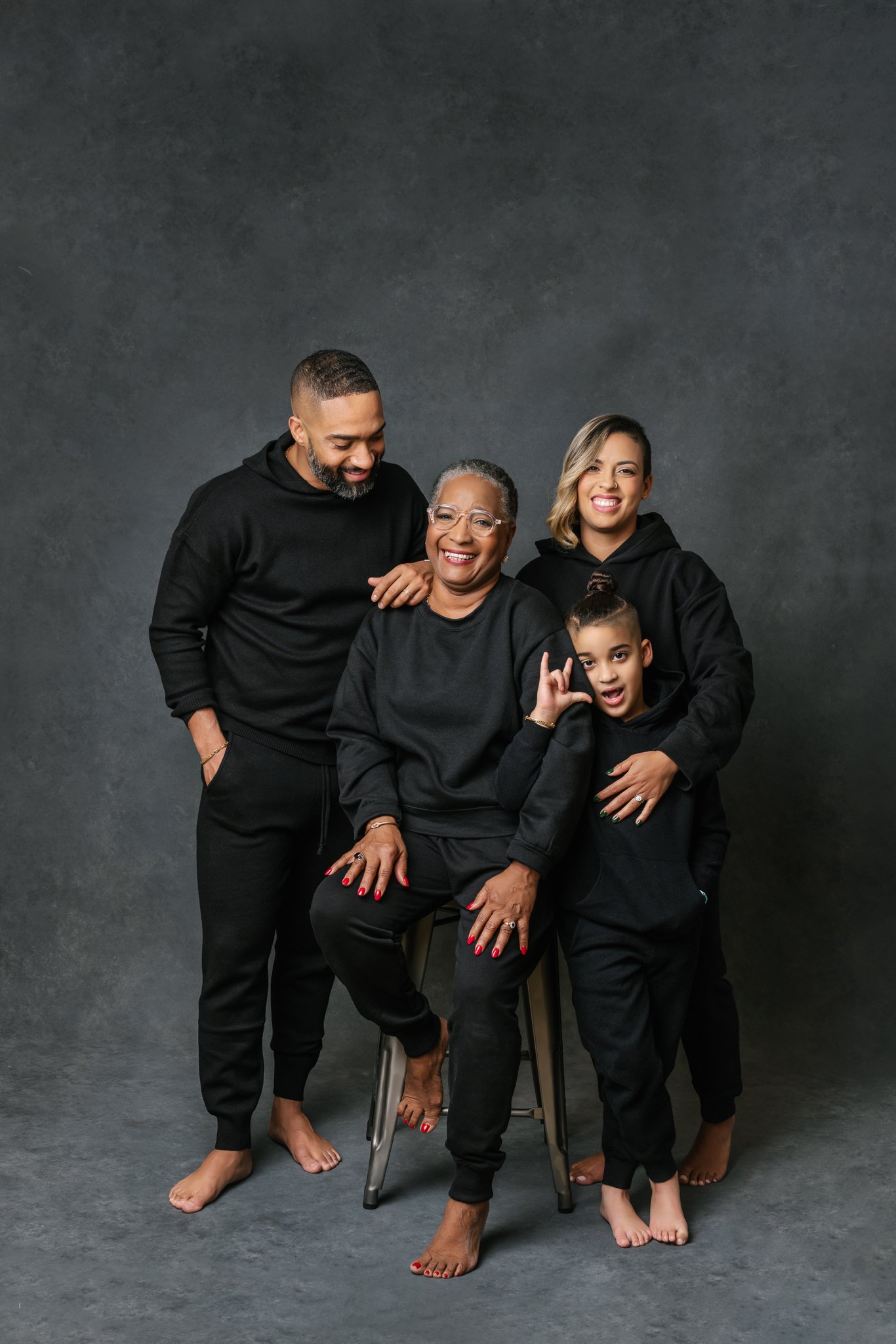  All-black family portrait taken at a studio in New Jersey by Nicole Hawkins Photography. black studio portraits #NicoleHawkinsPhotograaphy #NicoleHawkinsFamilies #Modernfamilypictures #studioportraits #matchingfamilyoutfits #NJphotographer 