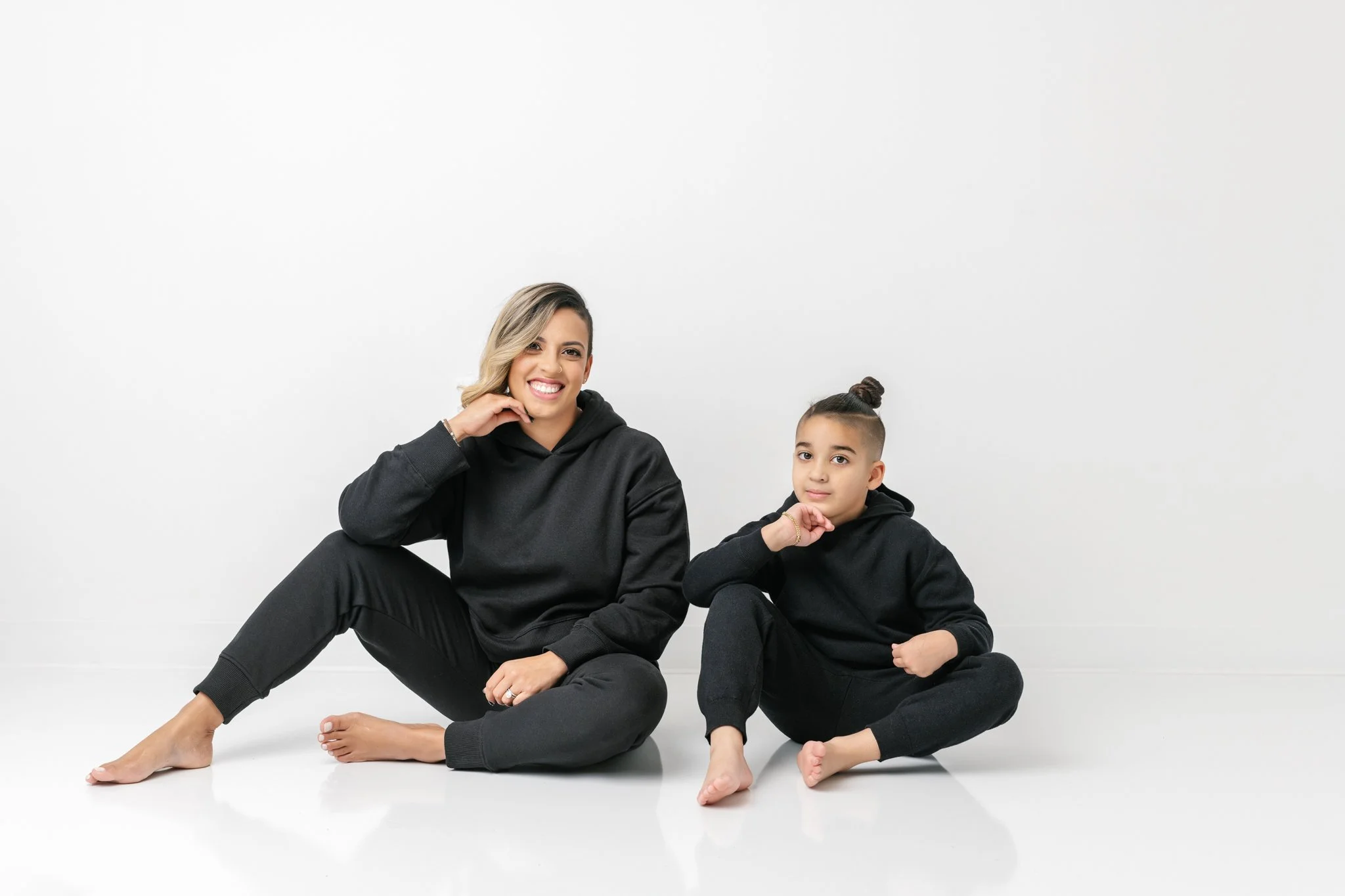  NJ studio photographer Nicole Hawkins Photography captures a mother-son personality portrait. personality portraits #NicoleHawkinsPhotograaphy #NicoleHawkinsFamilies #Modernfamilypictures #studioportraits #matchingfamilyoutfits #NJphotographer 