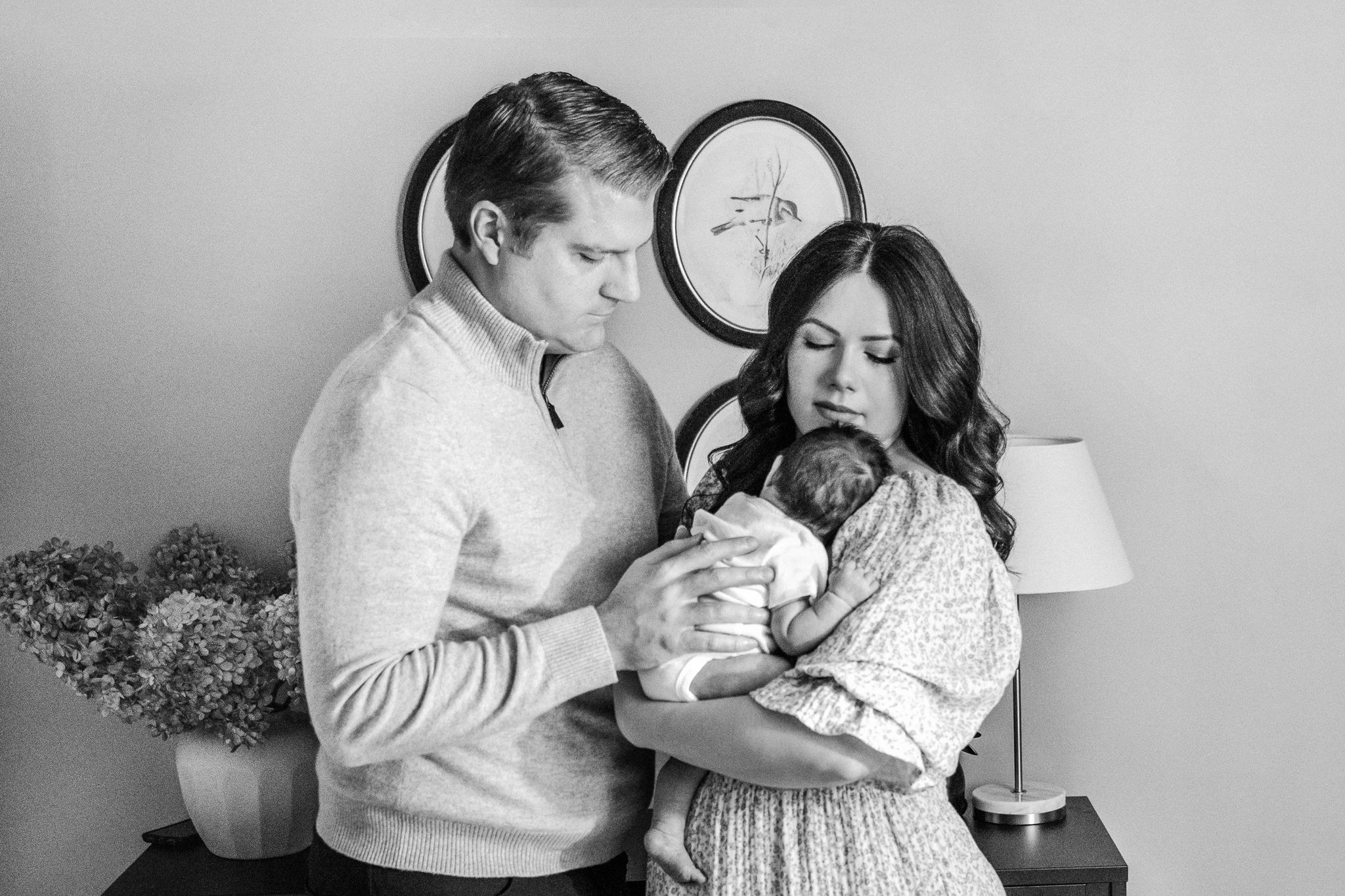  Nicole Hawkins Photography captures a black and white portrait of a mother holding her baby girl. Montclair newborn portraits #NicoleHawkinsPhotography #NicoleHawkinsNewborns #MontclairNewbornPhotographer #InHomeNewborns #NJNewborns #Babygirl #Newbo