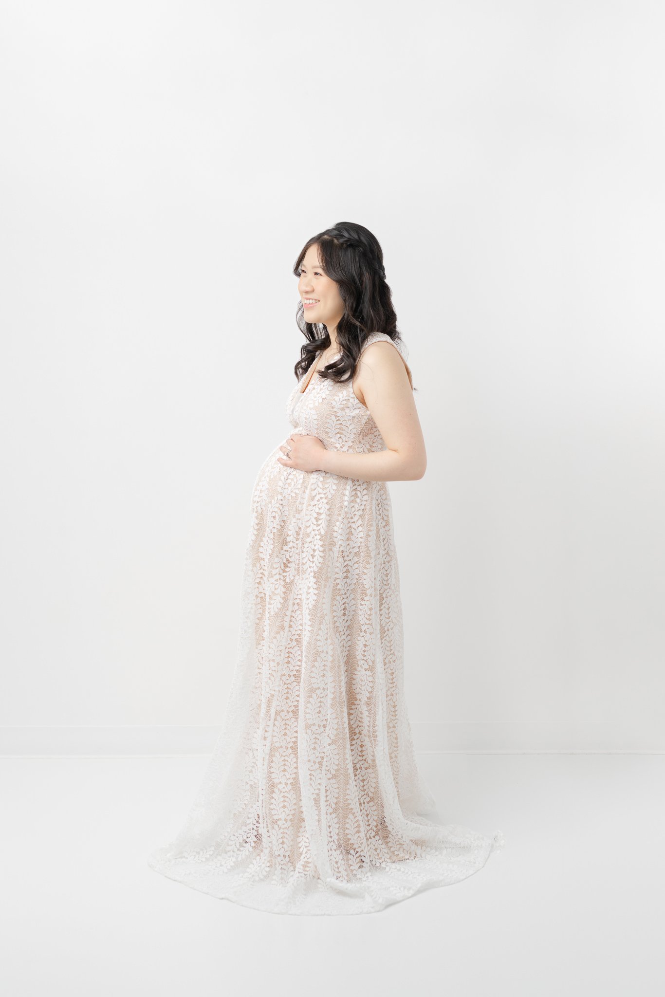  The side profile maternity portrait was taken at a New Jersey studio by Nicole Hawkins Photography. side maternity portrait Asian maternity #NicoleHawkinsPhotography #NicoleHawkinsMaternity #MaternityPhotography #Maternitystyle #NJMaternity #Timeles