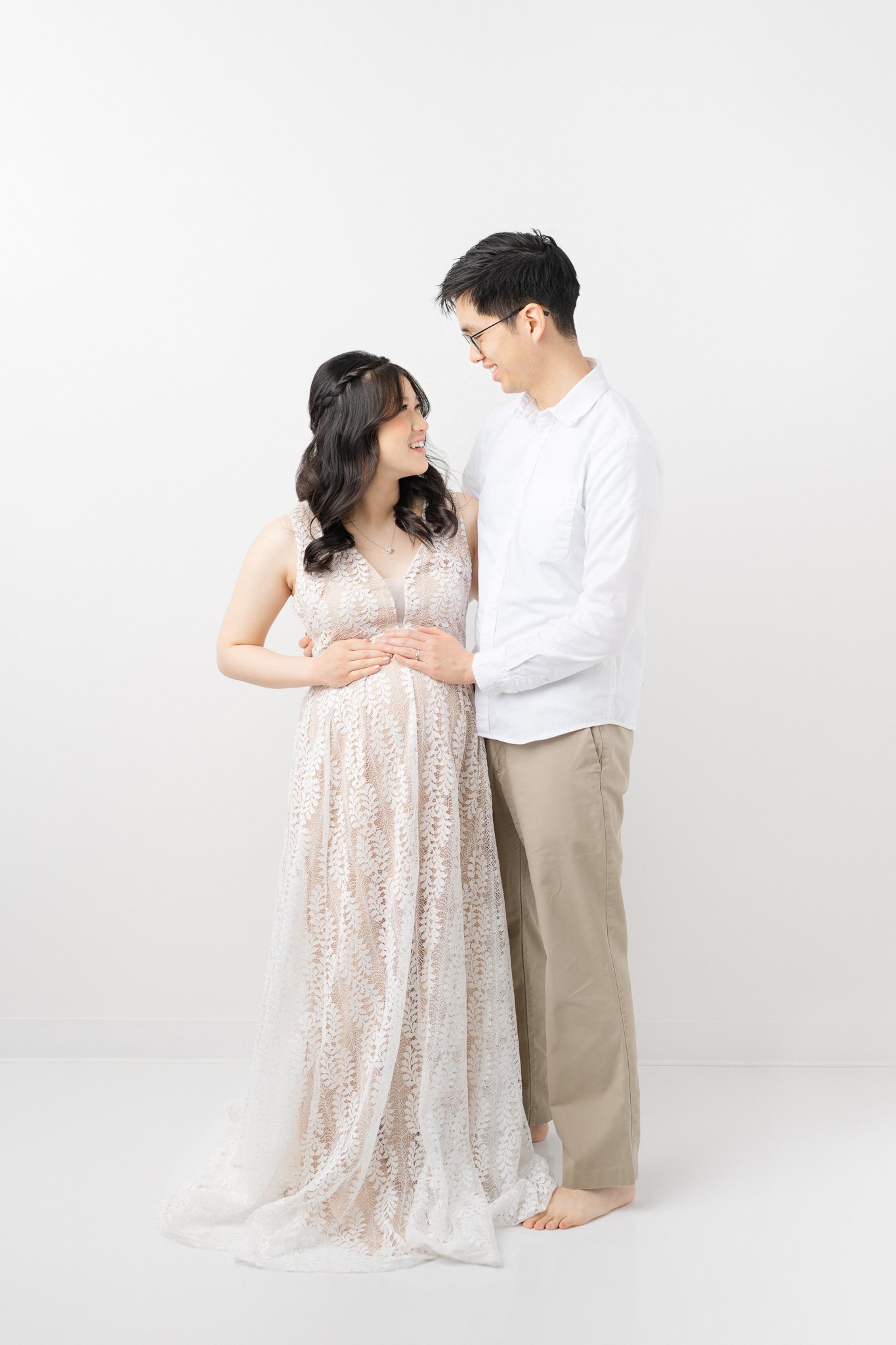  Classy family portraits were taken at a studio before the baby comes by Nicole Hawkins Photography. family of two baby on the way simple #NicoleHawkinsPhotography #NicoleHawkinsMaternity #MaternityPhotography #Maternitystyle #NJMaternity #TimelessPo