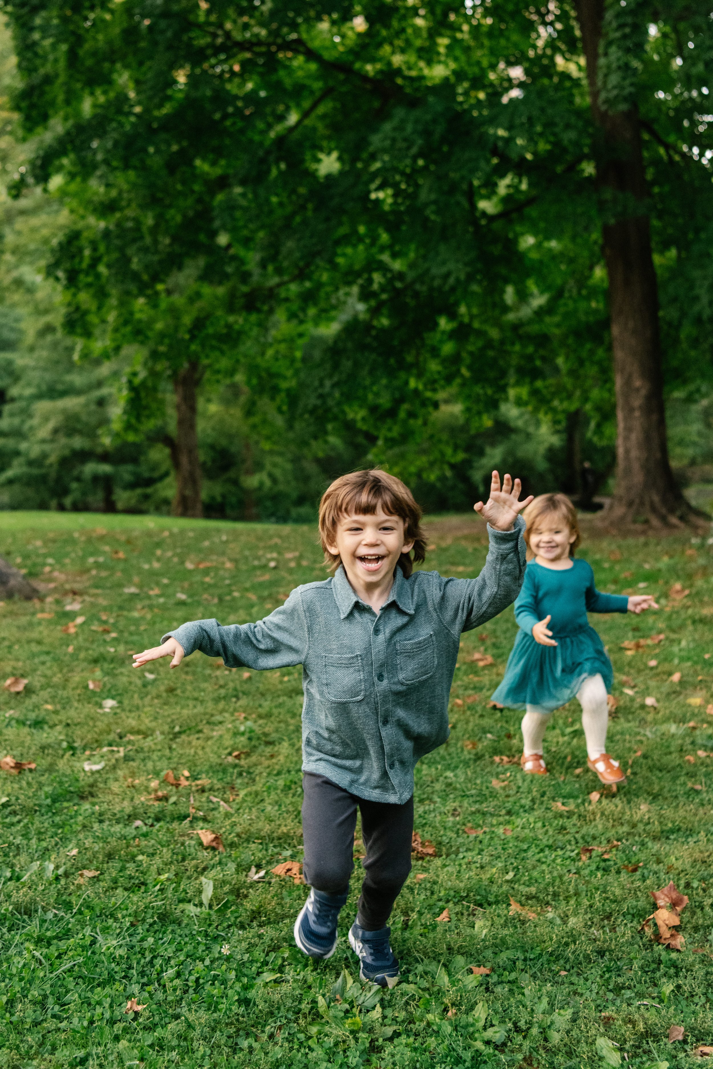  A silly picture of a family playing in central park in the fall time by Nicole Hawkins Photography. silly boy pictures NJ family photographer #NicoleHawkinsPhotography #NicoleHawkinsFamilies #NJphotographers #familyphotos #CentralParkPhotography #Ce