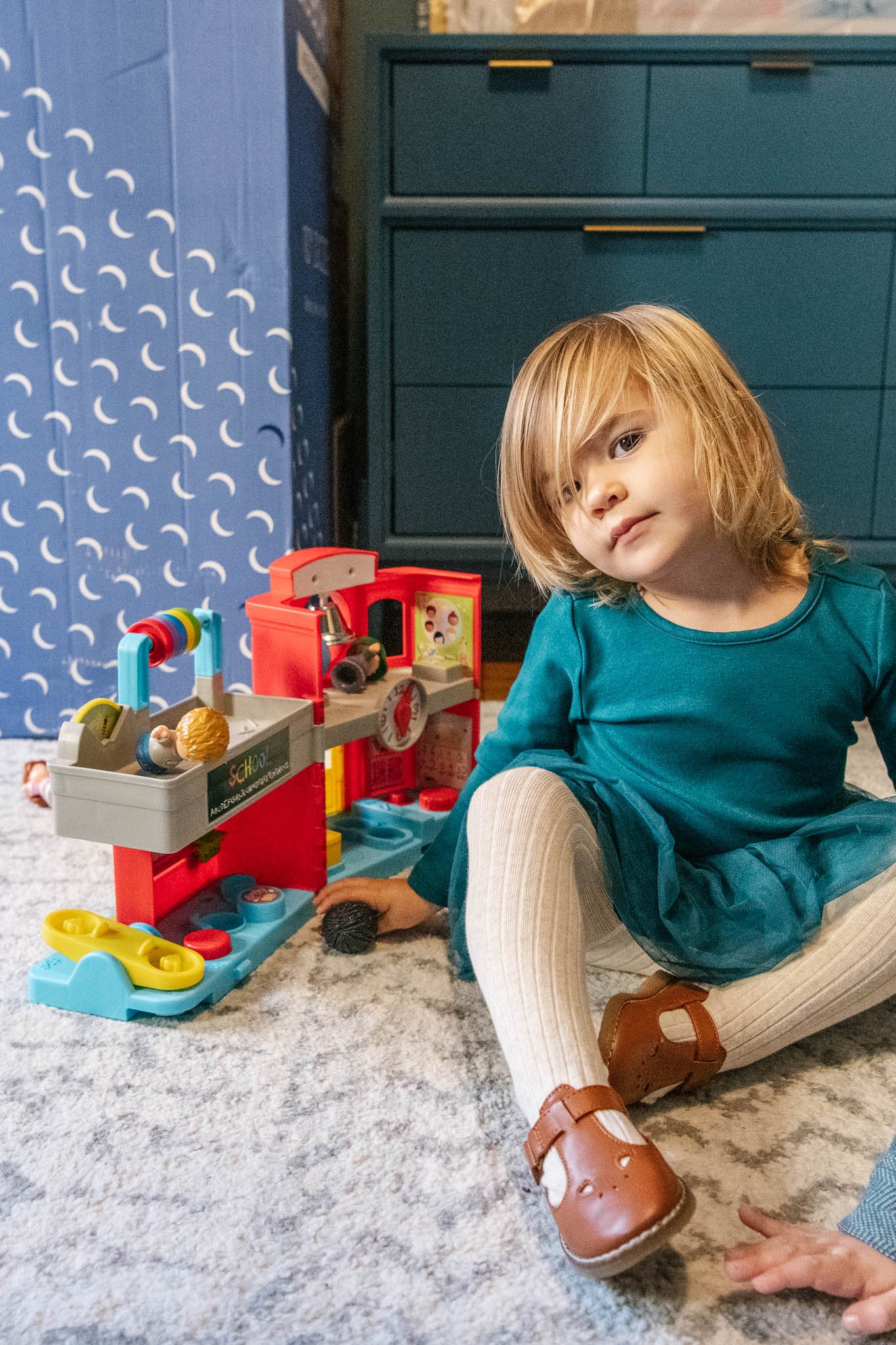  In-home photography of a little girl playing with her toys by Nicole Hawkins Photography. little girl playing with toys in home play photography #NicoleHawkinsPhotography #NicoleHawkinsFamilies #NJphotographers #familyphotos #CentralParkPhotography 
