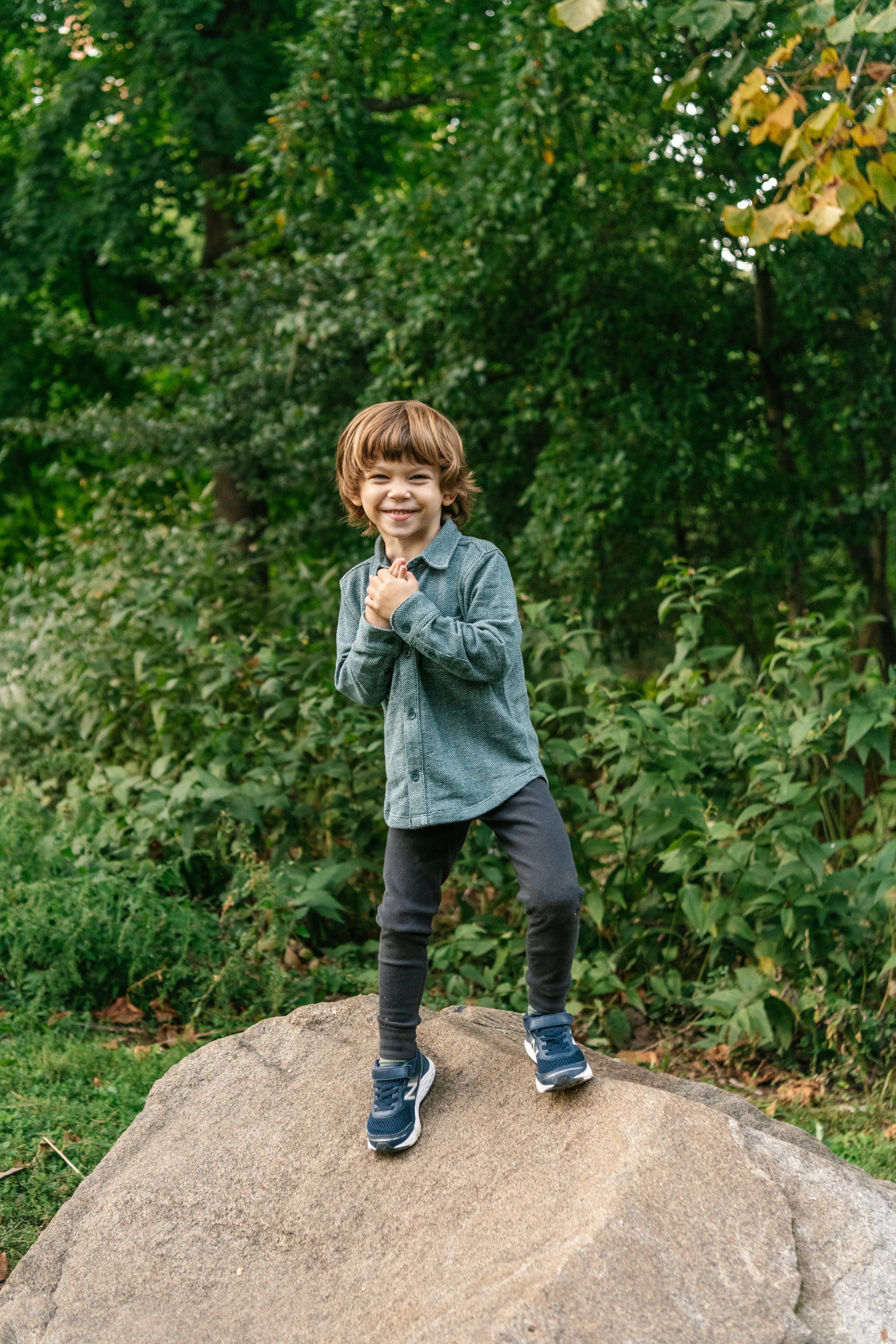  New York Family photographer captures a portrait of a young boy at Central Park by Nicole Hawkins PHotography. boy exploring portrait family photos in Central Park #NicoleHawkinsPhotography #NicoleHawkinsFamilies #NJphotographers #familyphotos #Cent