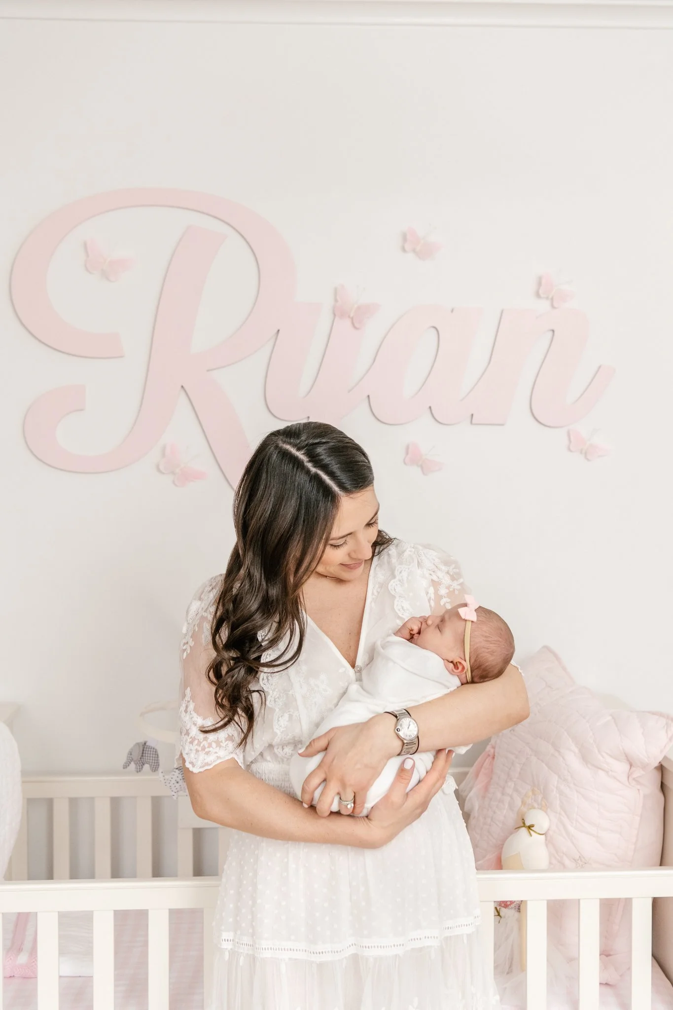  High-end newborn photographer Nicole Hawkins's Photography captures a mother holding her newborn in her arms glowing. newborn baby glow motherhood portrait #NicoleHawkinsPhotography #NicoleHawkinsNewborns #Babygirl #Newbornfamilyportraits #ChathamNe