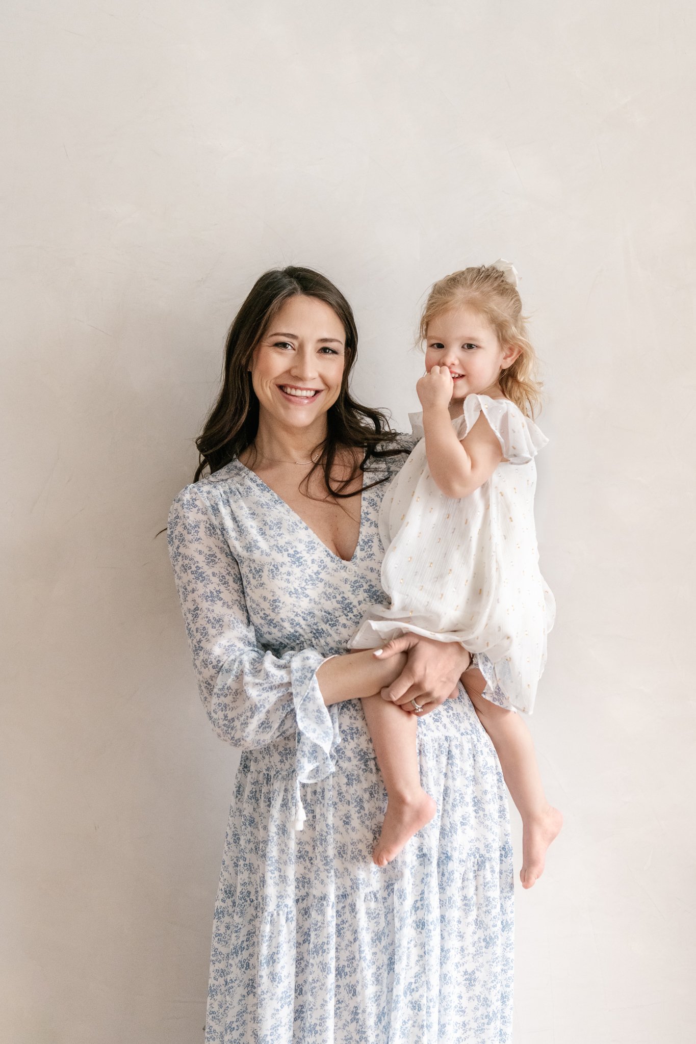  In Chatham, MA Nicole Hawkins Photography captures a portrait of a mother with her oldest child. mother and toddler girl baby girl style clean dress for pictures #NicoleHawkinsPhotography #NicoleHawkinsNewborns #Babygirl #Newbornfamilyportraits #Cha