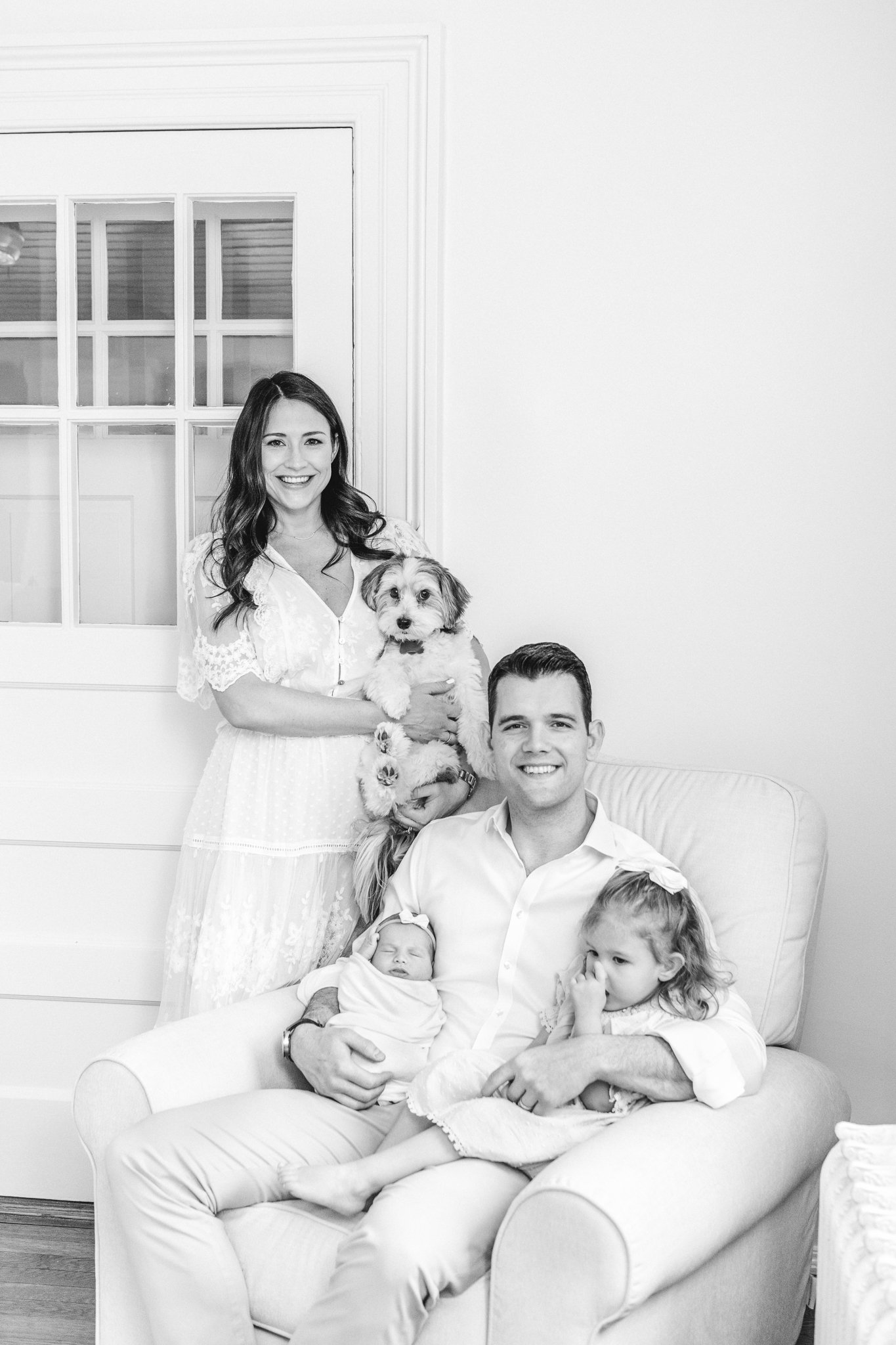  A family portrait with two little girls a dog and a mother and father by Nicole Hawkins Photography. newborn family portrait MA newborn MA photography #NicoleHawkinsPhotography #NicoleHawkinsNewborns #Babygirl #Newbornfamilyportraits #ChathamNewborn