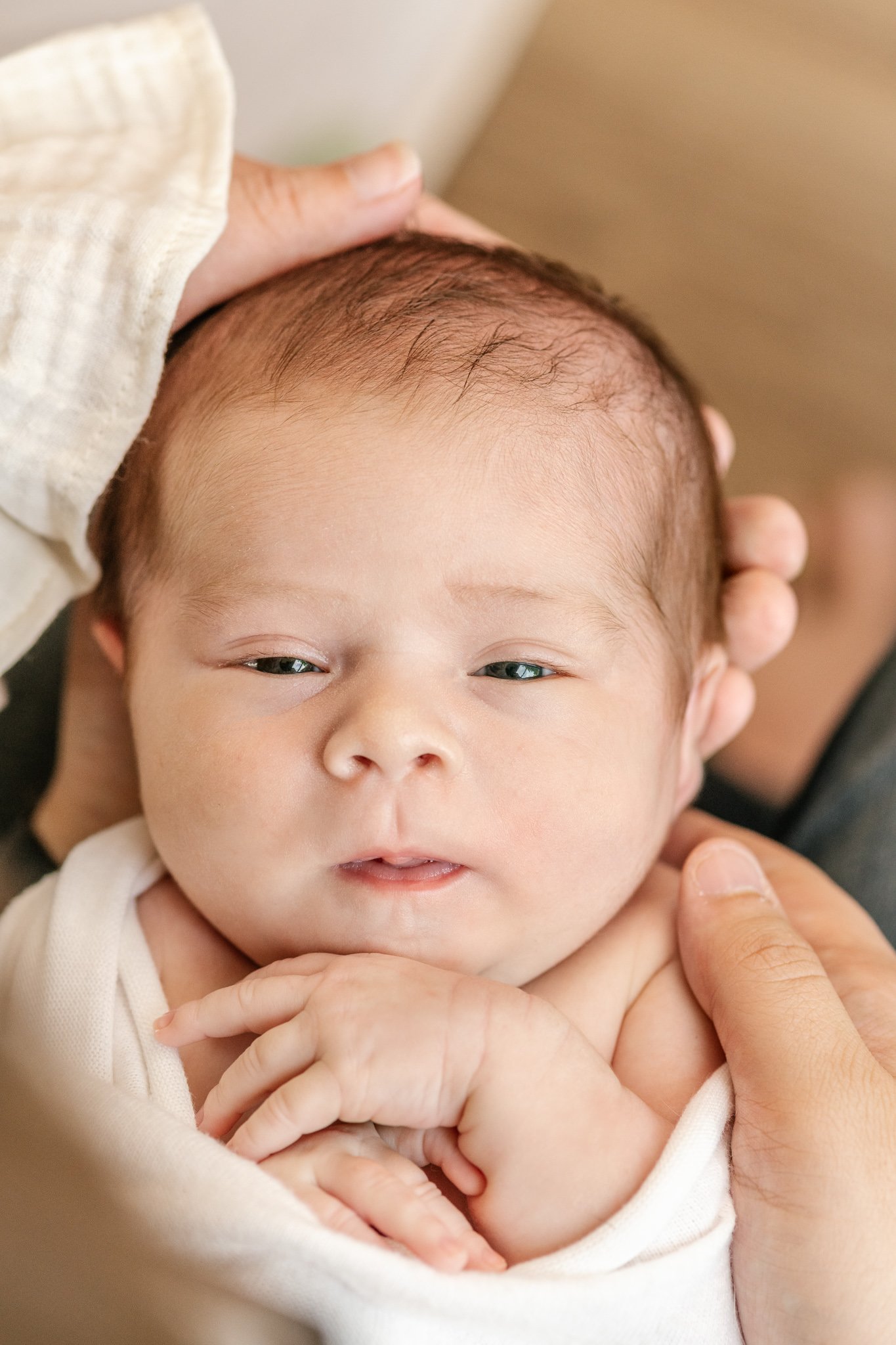  A close-up portrait of a baby girl falling asleep by high-end newborn photographer Nicole Hawkins Photography. sleeping baby in-home newborn session #NicoleHawkinsPhotography #NicoleHawkinsNewborns #Babygirl #inhomenewbornsNJ #homenewbonportraits #i