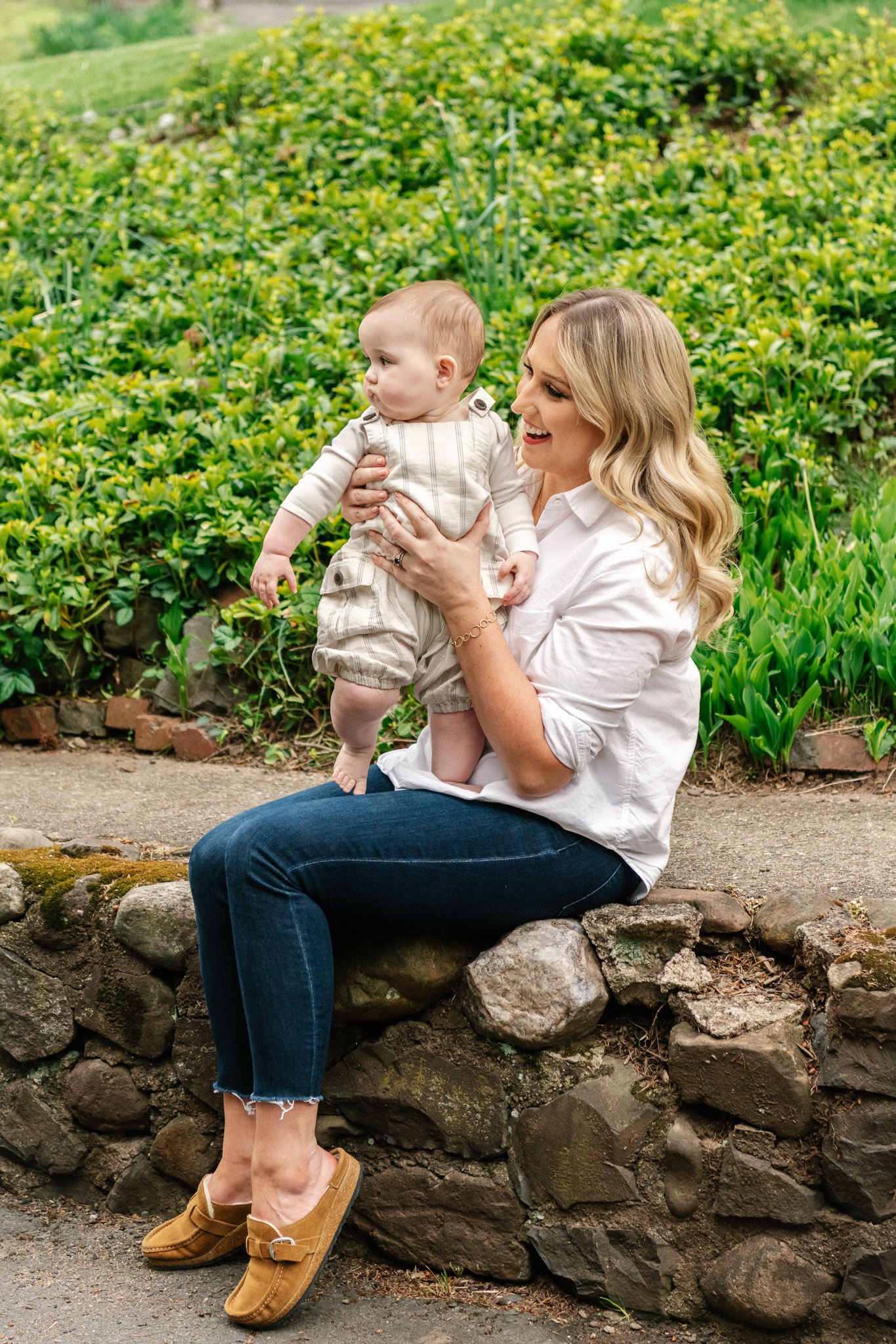  A mother laughs at her baby in South Orange, NJ by Nicole Hawkins Photography. family portraits professional at home portraits east coast #NicoleHawkinsPhotography #NicoleHawkinsfamilies #AtHomePortraits #EastCoastFamilyPhotographer #NewJerseyInHome