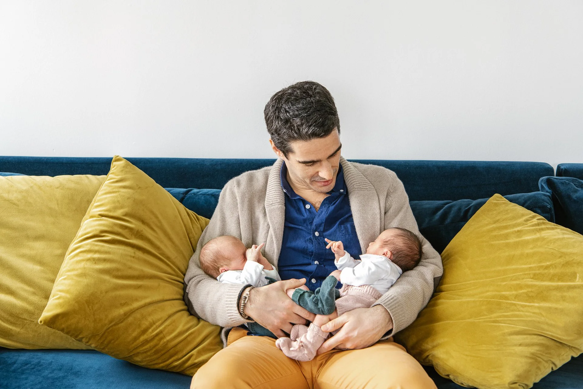  The cutest little newborn feet. Newborn twins lay side by side in timeless onesies during a Nicole Hawkins photography studio session.  #twinnewbornsessions #NicoleHawkinsphotography #newbornportraits #newbornstudioshoots #NewJerseyPhotographers #NJ