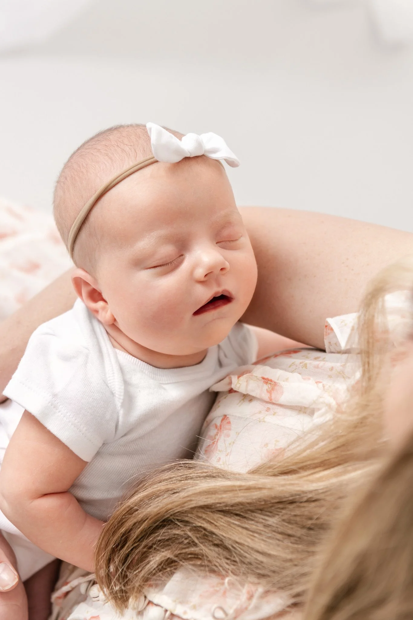     There is nothing more serene than a sleeping newborn snuggled into its mother. Northern NJ baby photographer Morris County Bergen County, NJ baby photographer studio photos #newbornandsiblingphotos #essexcountymoms #nicolehawkinsphotograph 