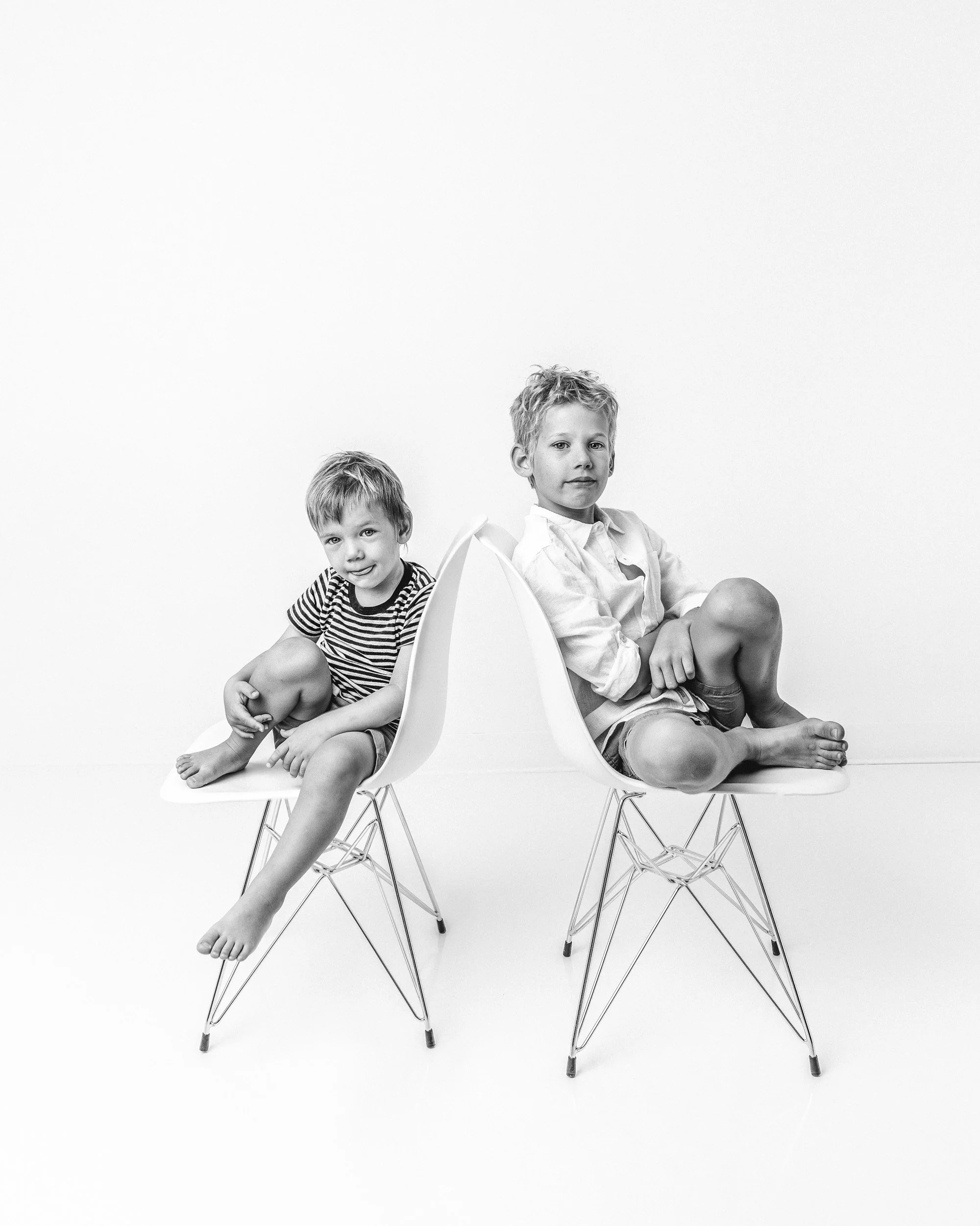 Studio-modern-Heirloom-child-portraitstoddler-and-big-brother-sitting-for-portrait-on-chairs-in-nj-studio-1.jpg