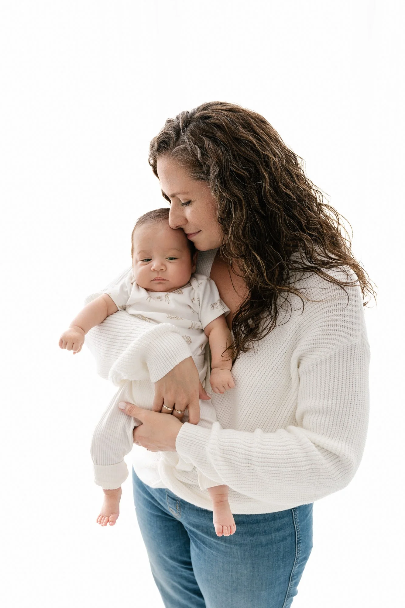 Bright and airy portrait of NJ mom and baby wearing cream knit outfits