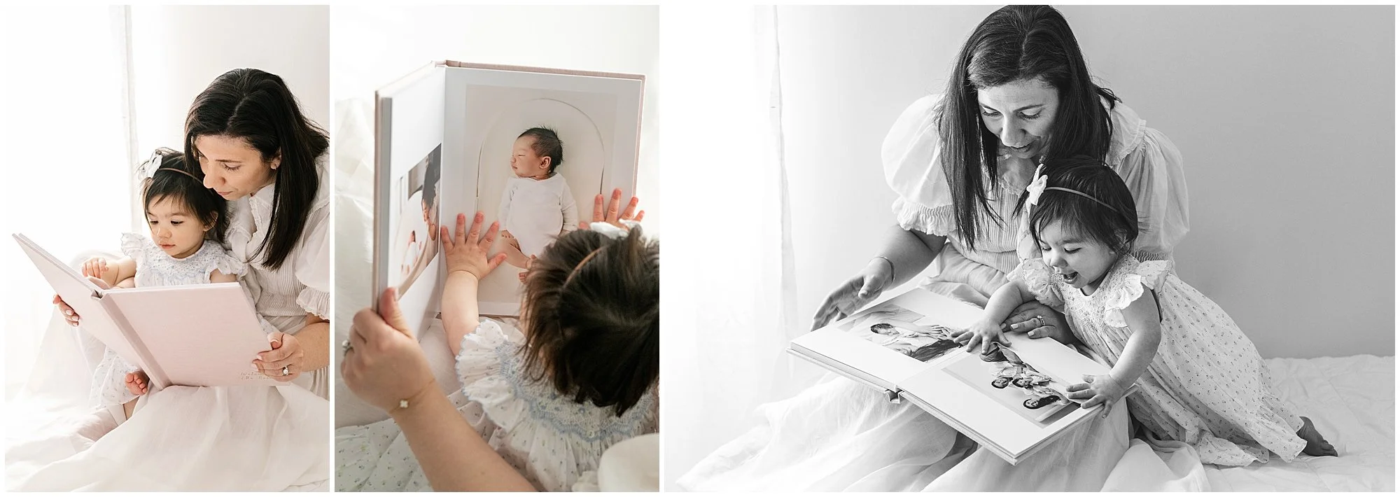A mom and one year old daughter looking at her pink newborn photography album in Nicole Hawkins' NJ photo studio.