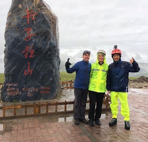 Celebrating the highest point of our trip at 4718m! In the days leading up to this pass I anticipated a triumphant arrival at the summit with sweeping views. In reality it was 6 hours of cycling uphill through pouring rain, and when we made it to the