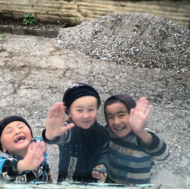 There's no better sight while cycling than the local kids running out to say hello. No matter how tired you are, it always puts a smile on your face when you see their grins. These guys were hanging outside the window of our guesthouse in Arslanbob, 