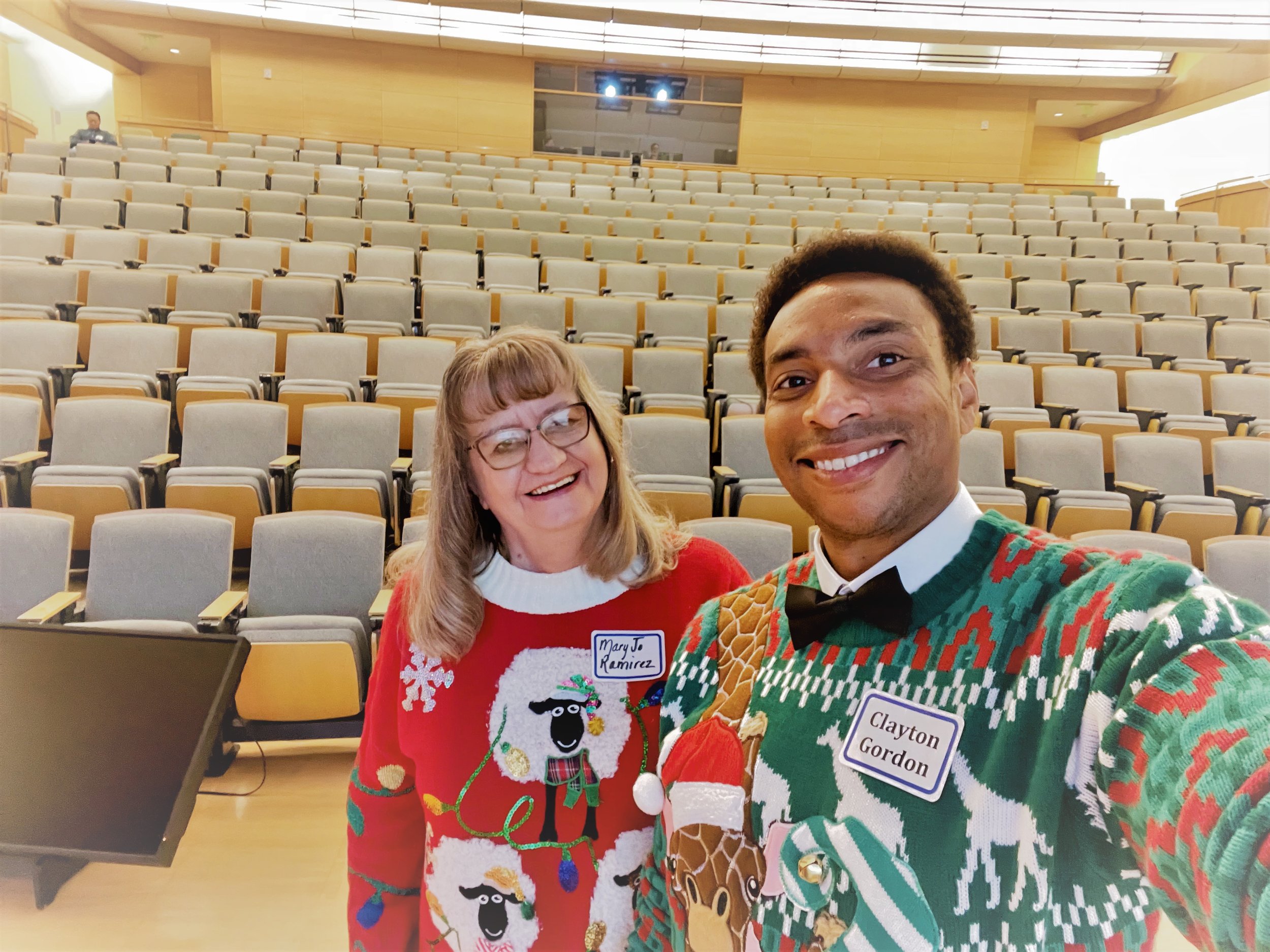 Mary Jo and Clay preparing for the audience to take their seats.