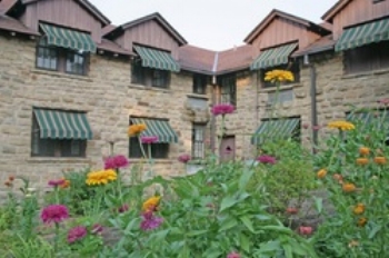 Cumberland Falls Lodge 7351 Highway 90, Corbin, KY 40701-8857 (606) 528-4121 Dupont Lodge -The solid hemlock beams and knotty pine paneling complement the massive stone fireplaces in historic DuPont Lodge. Fifty-one rooms offer beautiful views and full amenities including interior corridors. All rooms totally renovated in 2006. Relax on the beautiful, large observation deck overlooking the Cumberland River winding thru the hillside. It provides a spectacular spot for a wedding. Woodland Rooms - Cumberland Falls has special accommodations adjacent to the lodge that offer the privacy of cottages. Larger than a lodge room offering a wet bar, small refrigerator, microwave, coffee pot, small porch and outdoor grill. Perfect if you want an adjoining room, reserve two and open the connecting door http://parks.ky.gov/parks/resortparks/cumberland-falls/