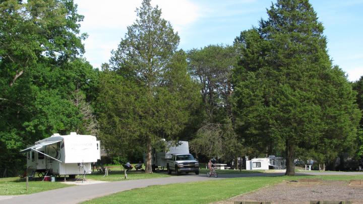 Cove Lake Campground, Cove Lake State Park Rates: $24Taxes and fees are not included. Rates subject to change. $5 reservation fee per site is non-refundable. Cove Lake has 106 campsites. All sites are equipped with water and electrical hookups, and most with grills and tables. A dump station is available, as are two modern bathhouses containing hot showers, commodes, and lavatories. Stay limit is two weeks. Tents are allowed on all the campsites. Note Campers: After 4:30 PM ET, please call 423-494-0806 instead of the park office. http://tnstateparks.com/parks/campground/cove-lake