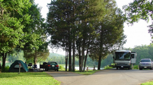 BIG RIDGE CAMPGROUND Rates: $25 — $27Taxes and fees are not included. Rates subject to change. $5 reservation fee per site is non-refundable. Big Ridge has 50 campsites on or near Norris Lake to accommodate RV’s, trailers, and tent campers. RV campsites have a paved slip and a soft gravel pad and can accommodate a unit up to 35 feet. Each site has water and 50-amp electrical hookups, picnic table and grill. A dumping station is provided, as well as three bathhouses with restrooms and hot shower facilities. Bathhouses #2 and #3 are closed during the off-season from November 1 to March 31. Firewood is sold onsite and the camp store is open seasonally.