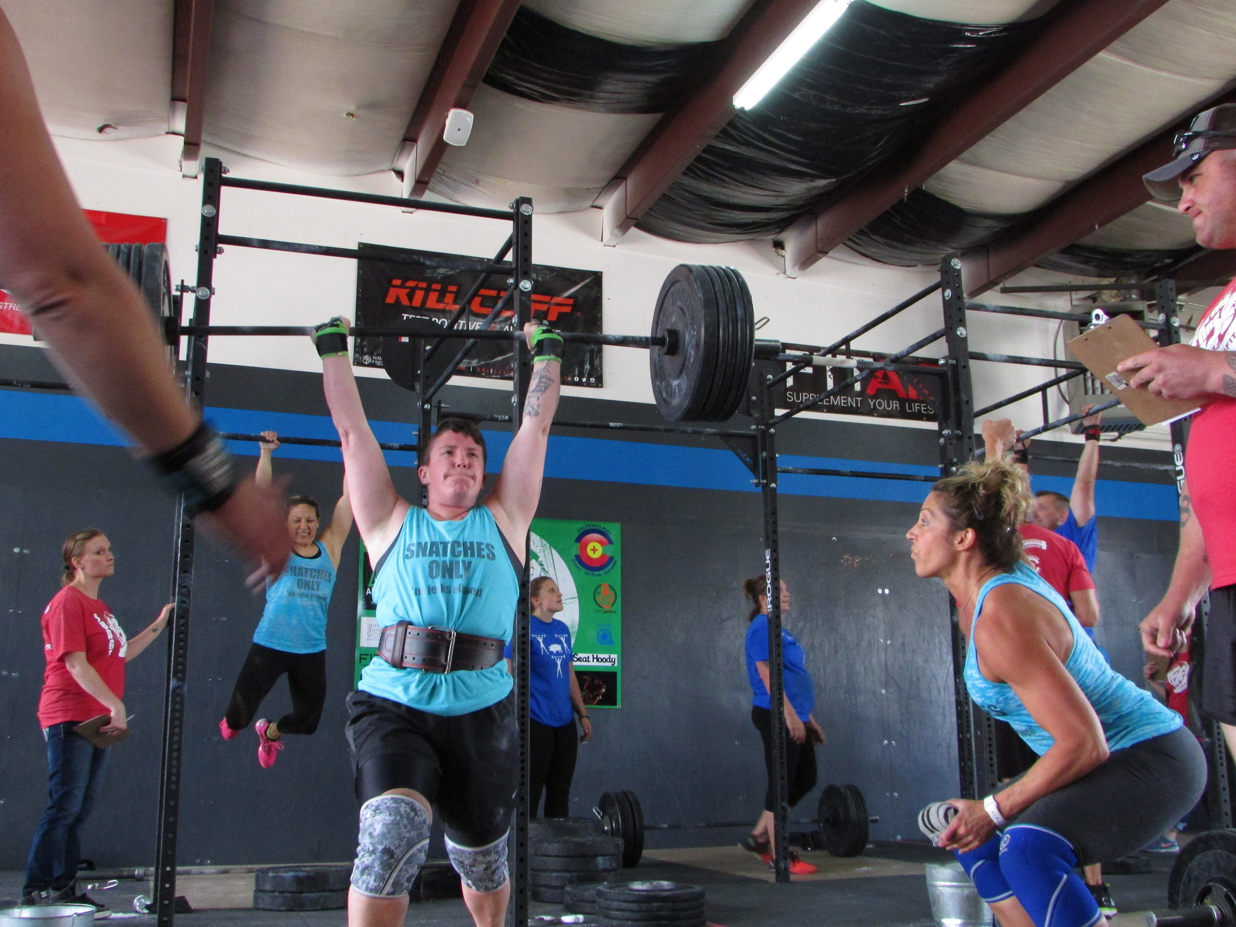  I love all of our faces in this one! Sheri in the back working those chest to bars, Ashlee working her 180lb pr, and me somehow transferring some power to Ashlee! Even our judge is grunting! haha!