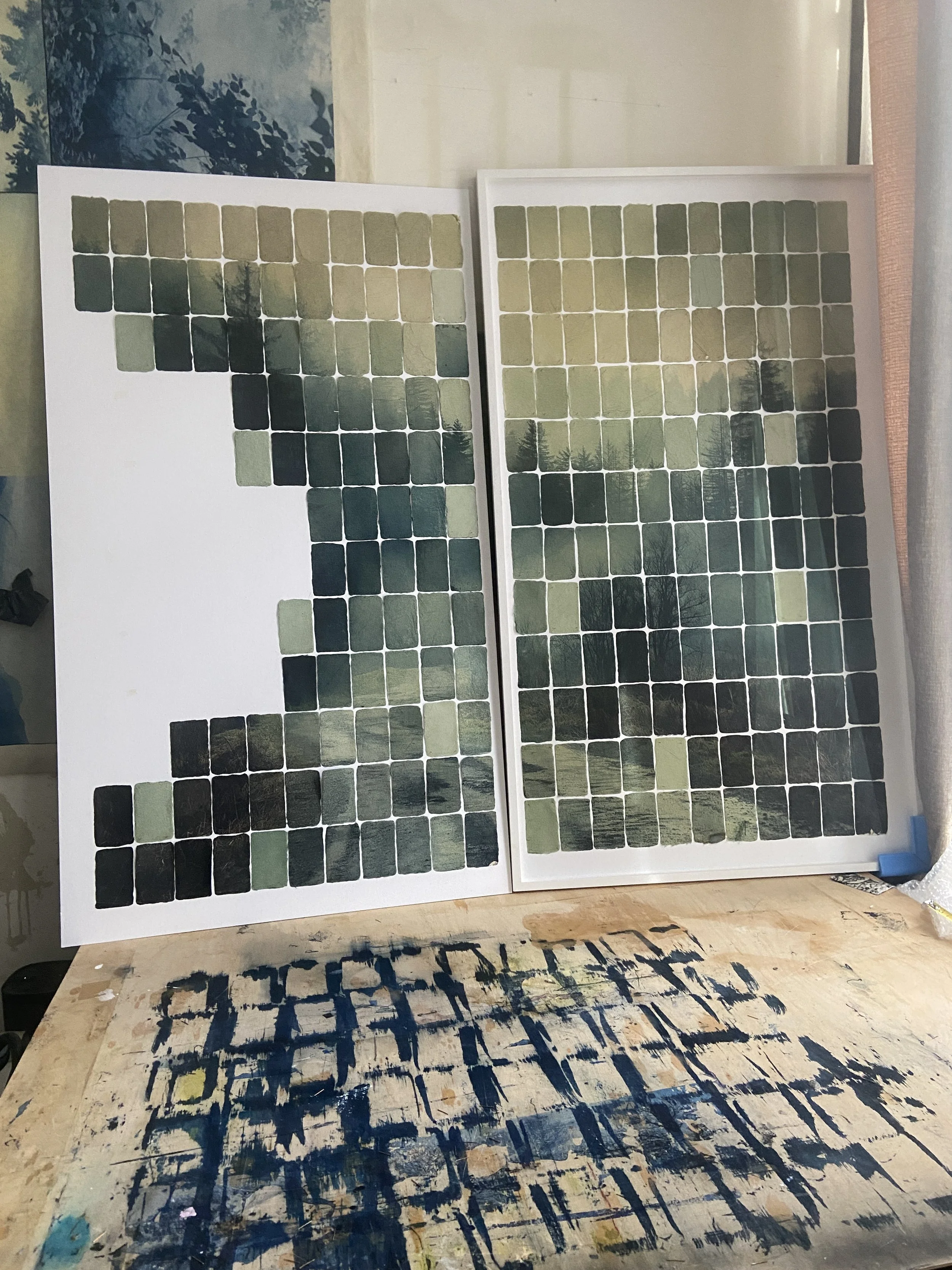 Two forest landscapes made from photographic cards in Joost Vandebrug’s studio, with a large gap in the left composition.