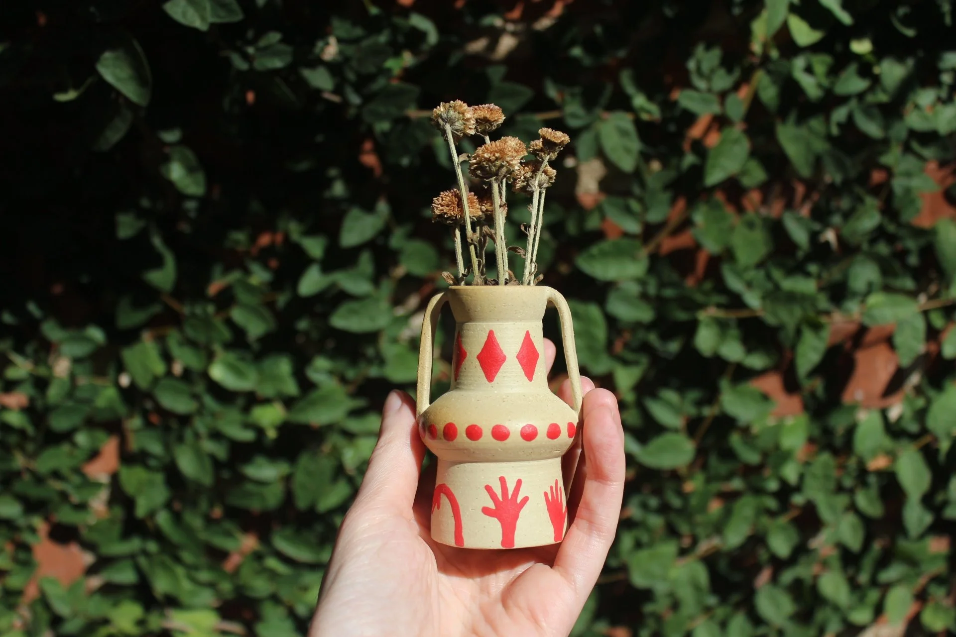 circus hands baby vase