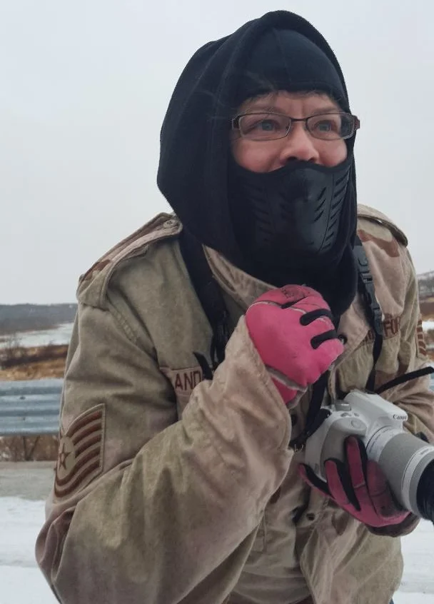 Janette shooting at the Norden Bridge on January 14, 2018 shooting along the Niobrara River in the rain. Like I said....glamorous! That's me.