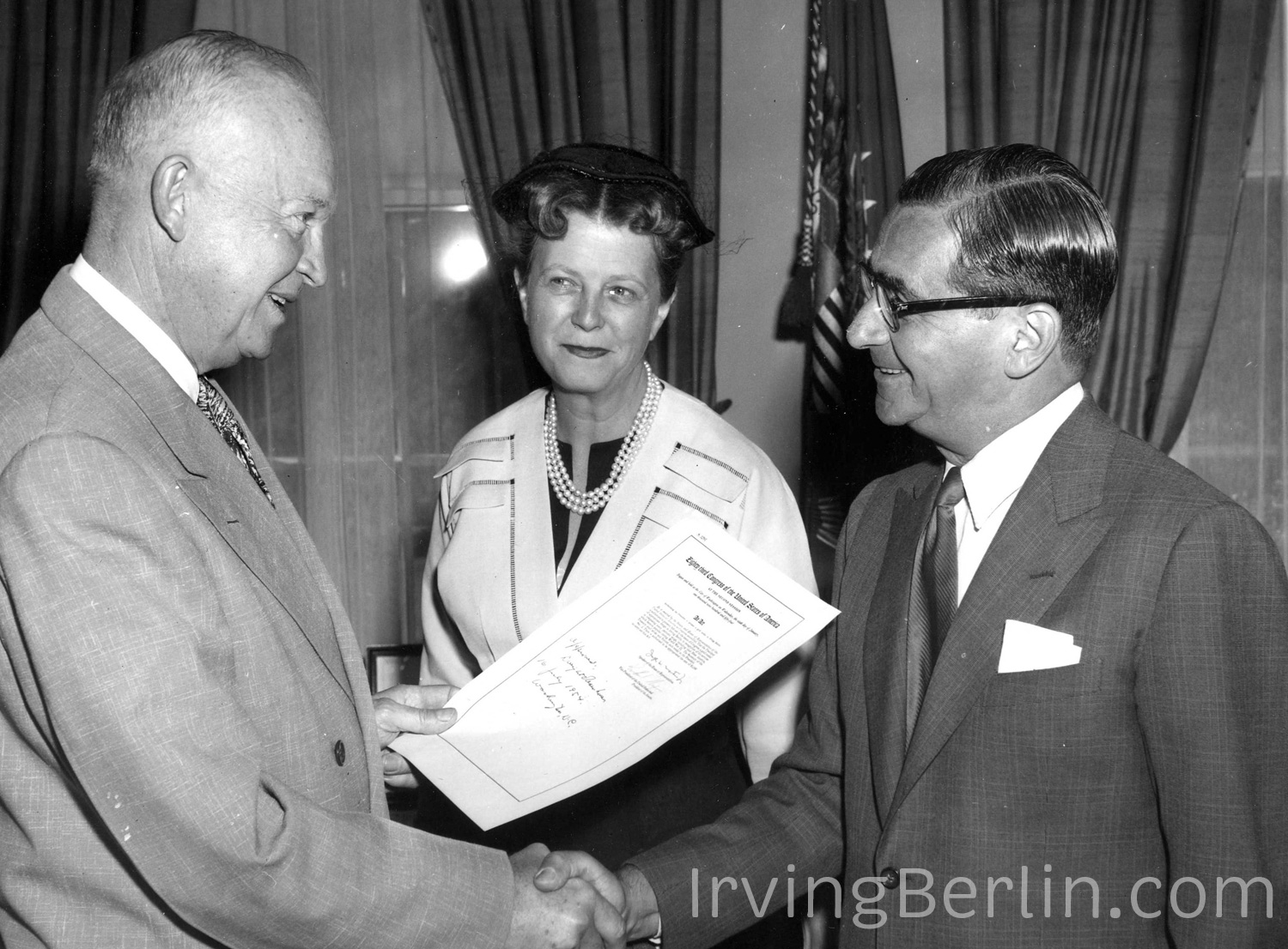  Irving Berlin, pictured with his wife Ellin, receiving a Congressional Gold Medal from President Eisenhower. 