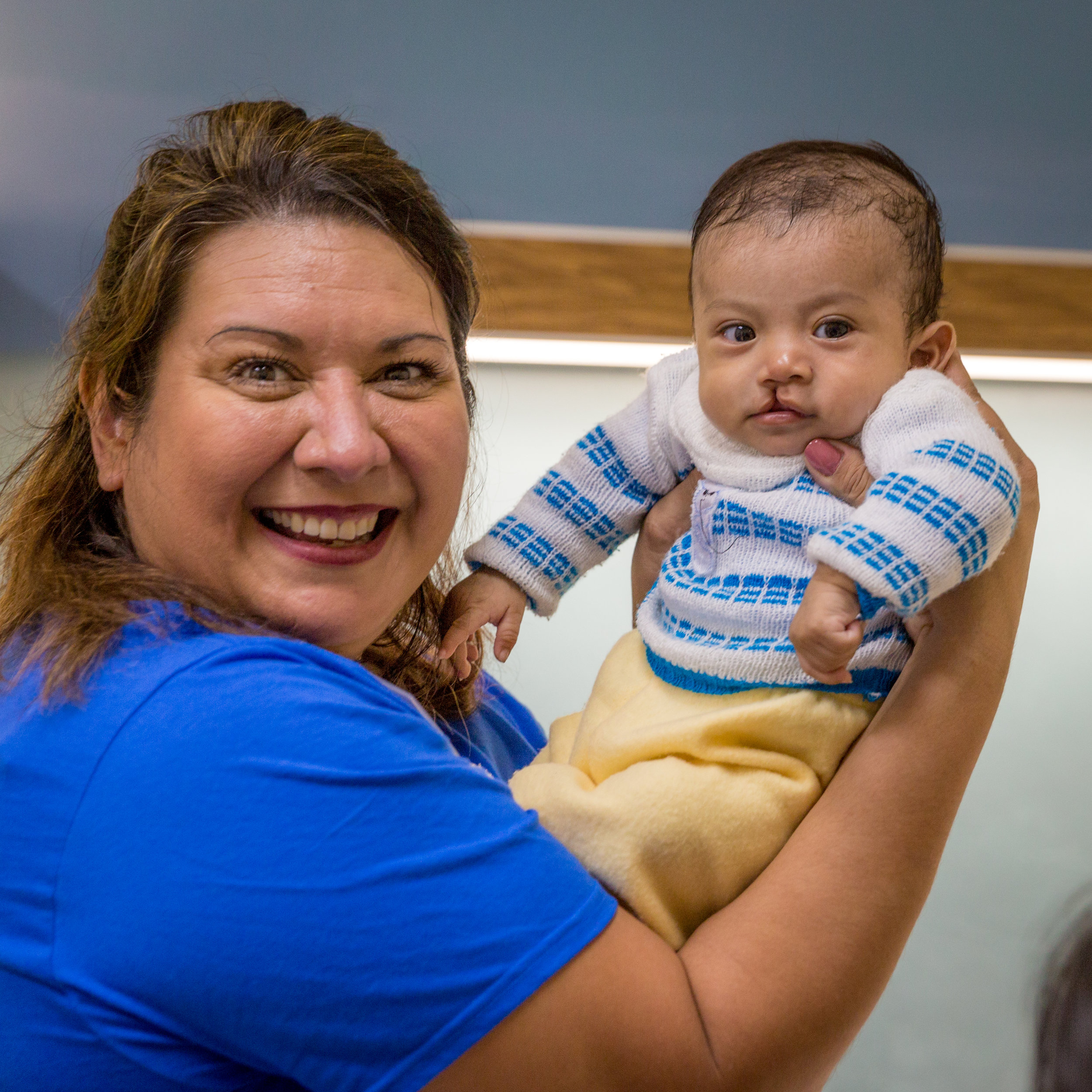 Cecilia Canales holding Wilmer, four months,​.jpg