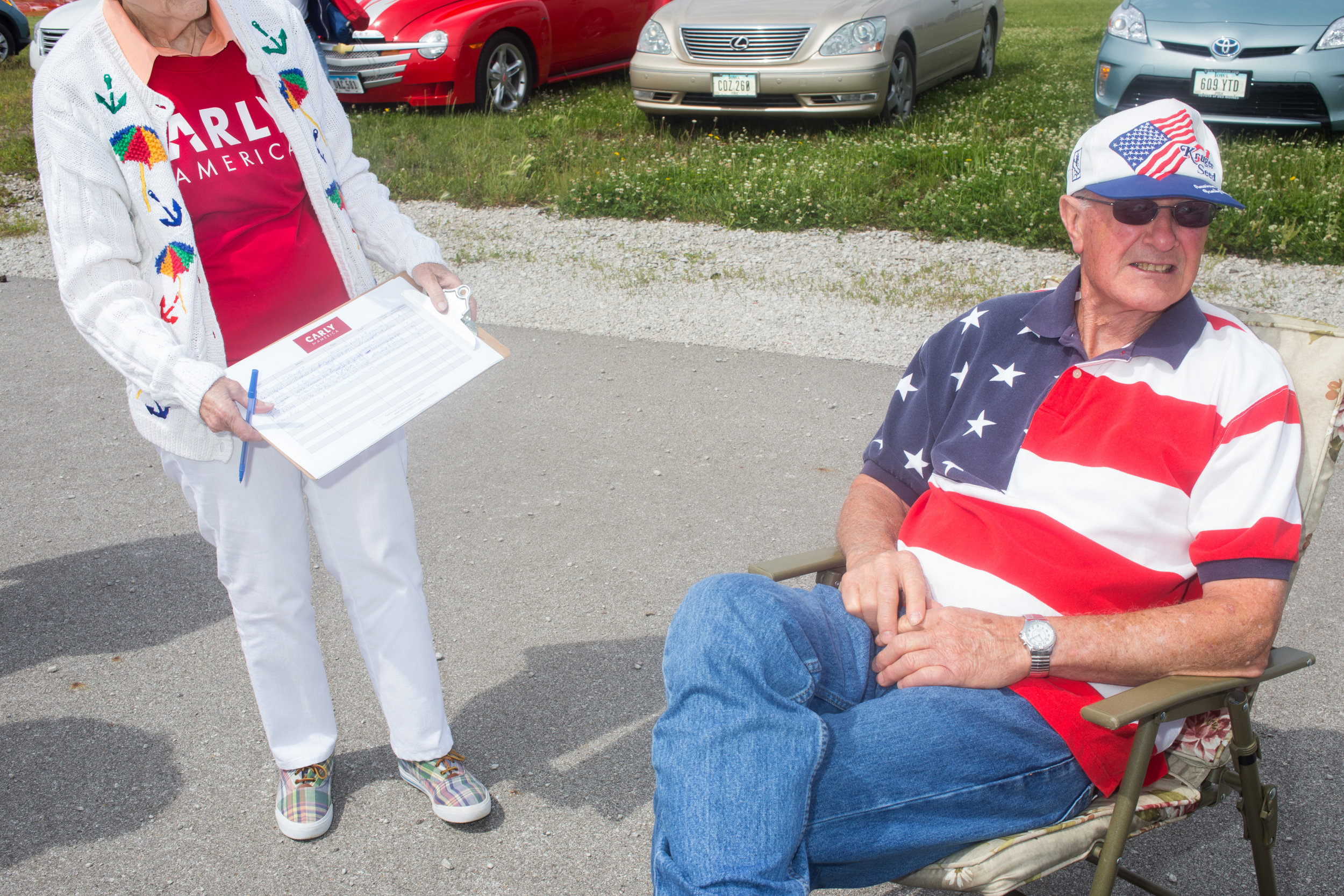  A volunteer for Carly Fiorina’s campaign gauges interest at Senator Joni Ernst's First Annual Roast &amp; Ride on June 6, 2015 in Boone, Iowa.  