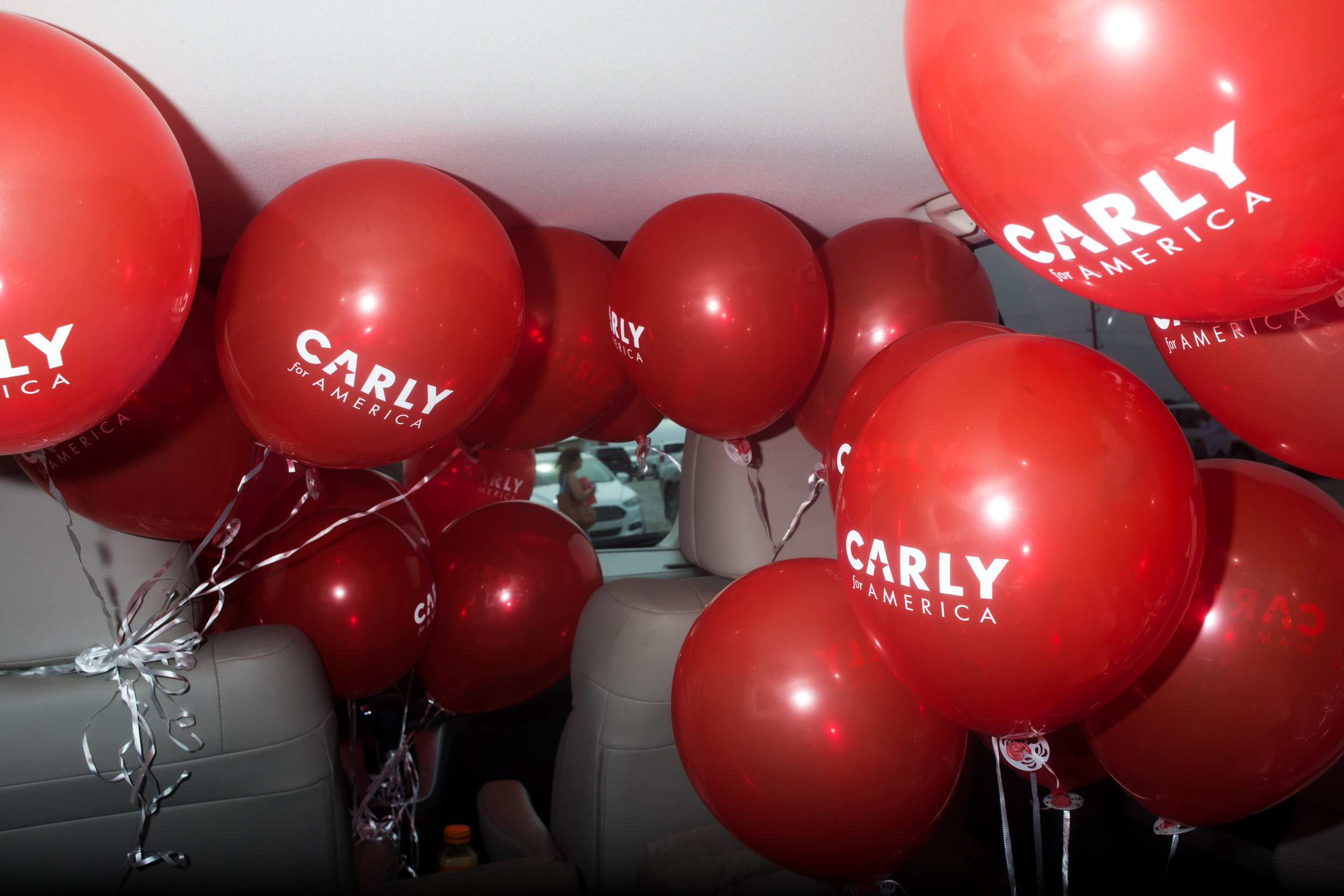  Carly Fiorina balloons fill the inside of a car at Senator Joni Ernst's First Annual Roast &amp; Ride on June 6, 2015 in Boone, Iowa.  