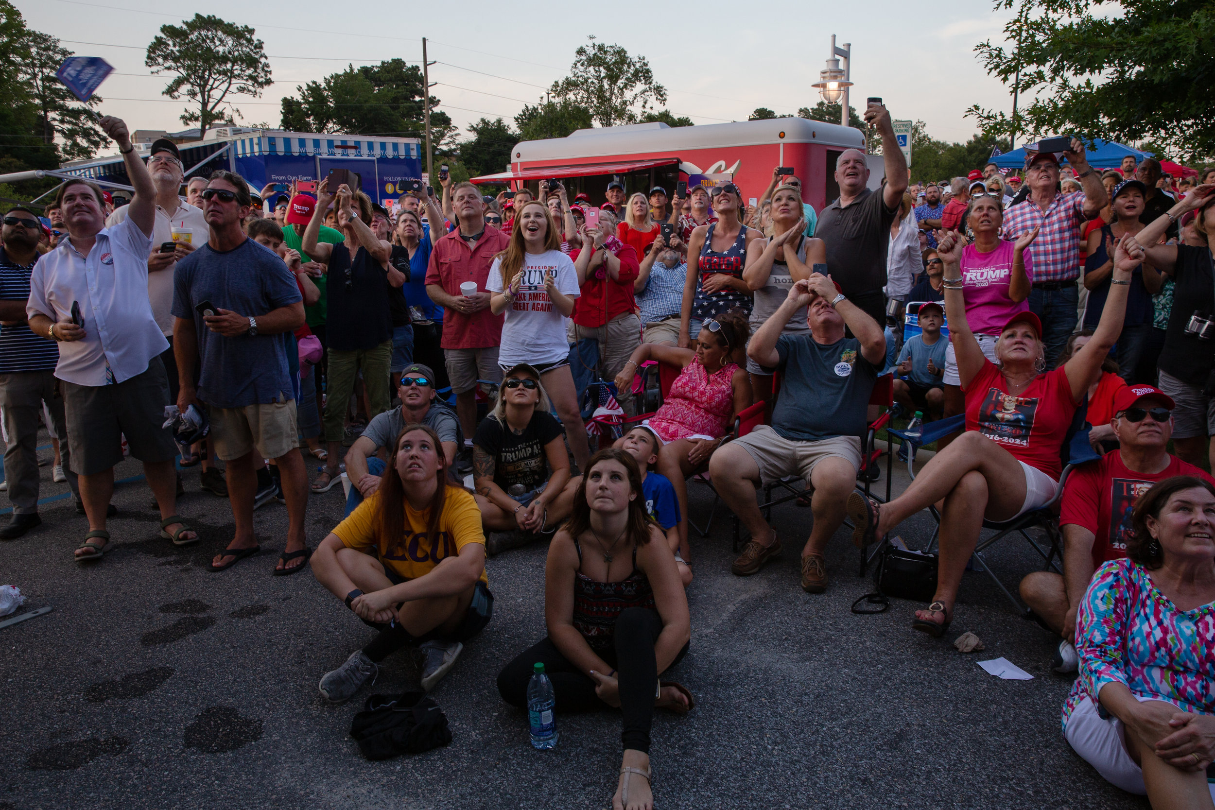  Trump supporters congregate outside Williams Arena on East Carolina University's campus on July 17, 2019 in Greenville, NC. The "Send her back!" chant—referring to Rep. Ilhan Omar—debuted at this rally. (For The Atlantic) 